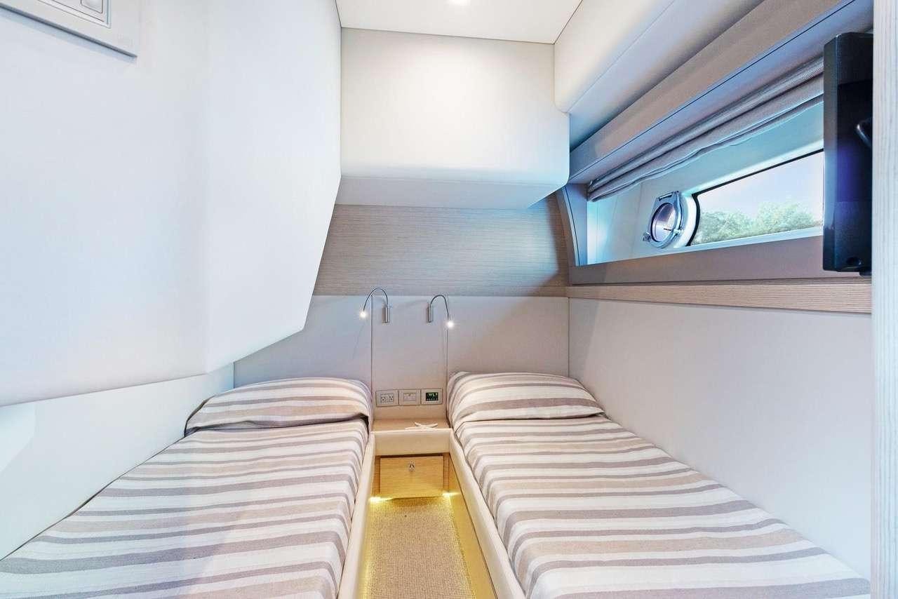 a room with bunk beds aboard LINDY LOU Yacht for Charter