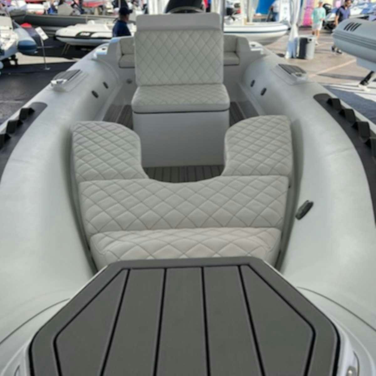 a couple of chairs in a room aboard LINDY LOU Yacht for Charter