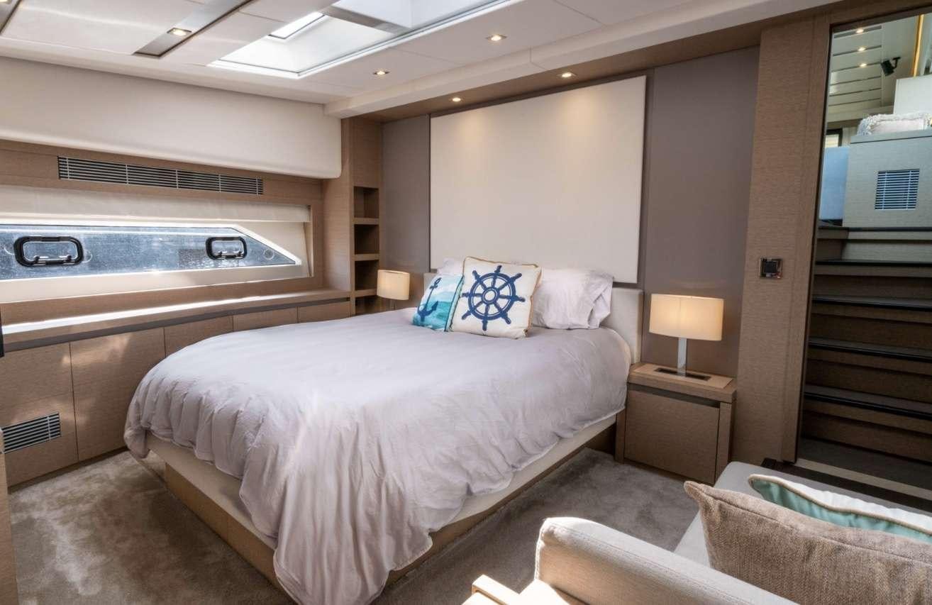 a bed in a room aboard VIMA Yacht for Charter