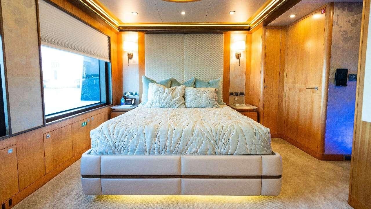 a bed in a room aboard SERENITY Yacht for Charter