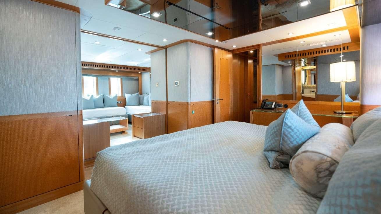 a bed in a room aboard SERENITY Yacht for Charter
