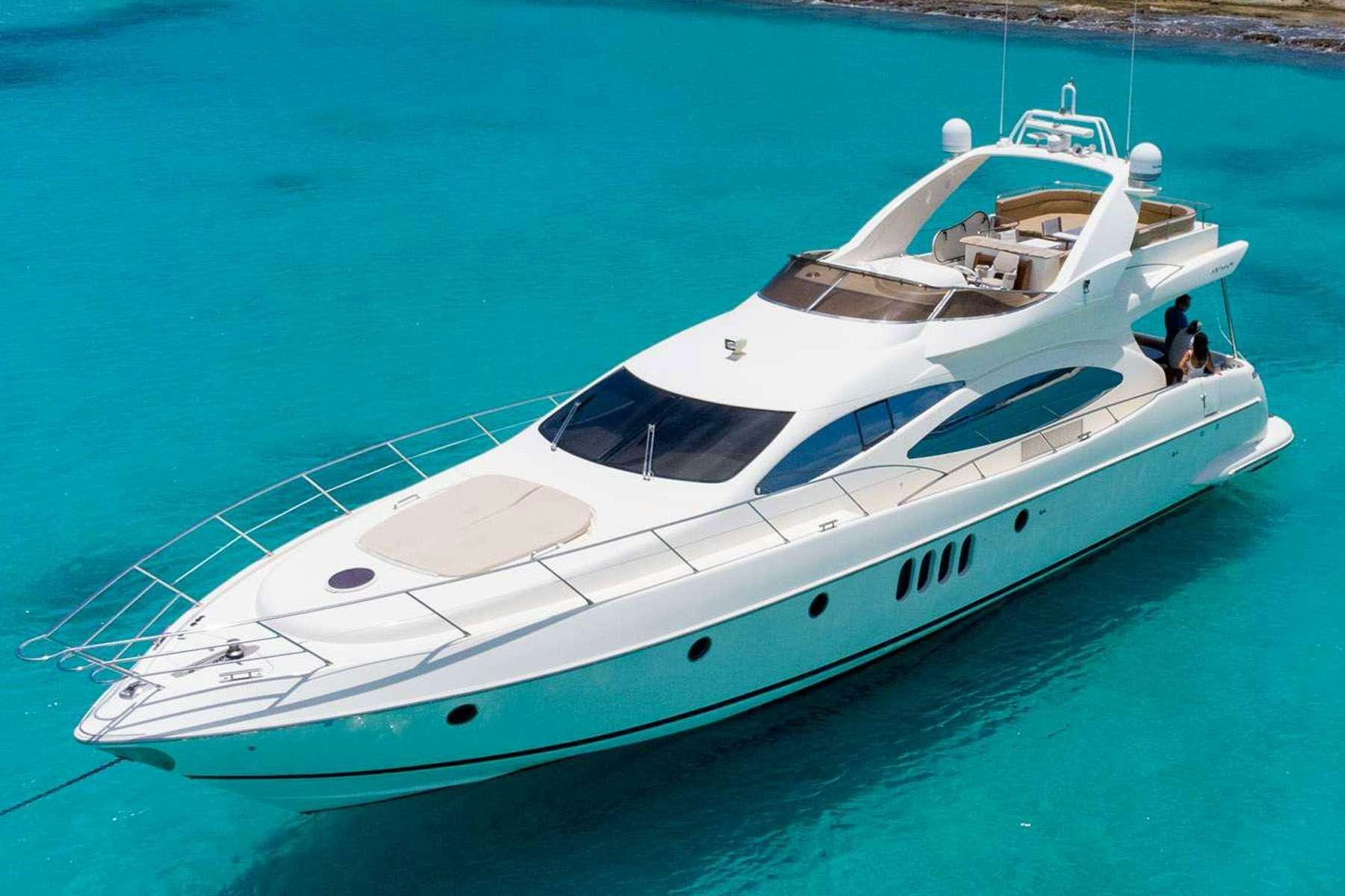 a white yacht on the water aboard VICTORIA Yacht for Charter