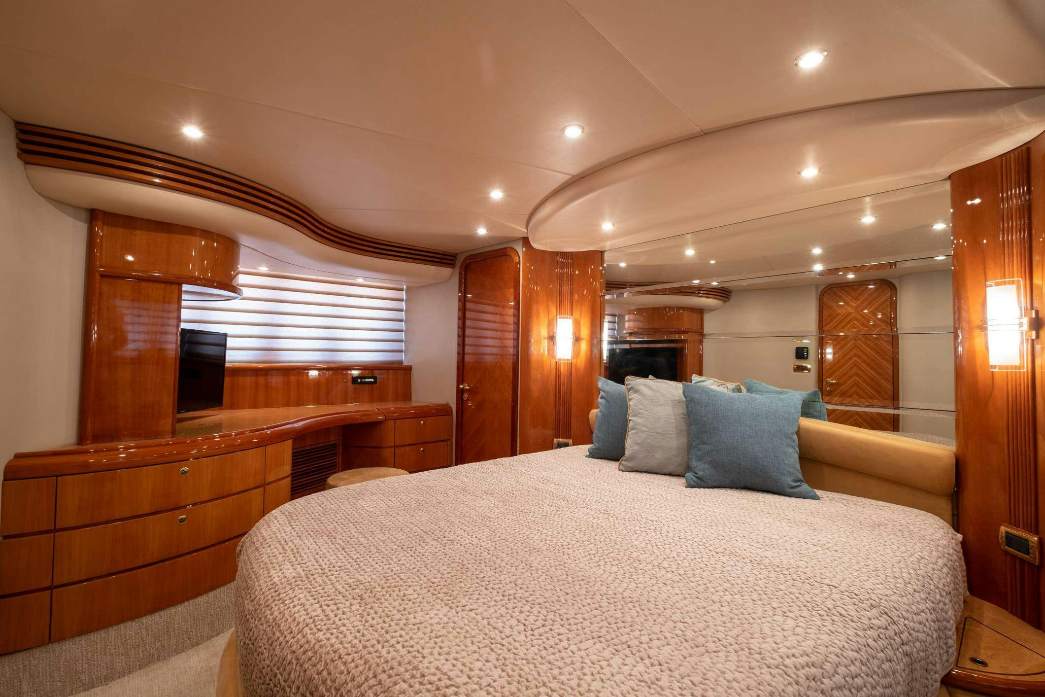 a bed in a room aboard VICTORIA Yacht for Charter