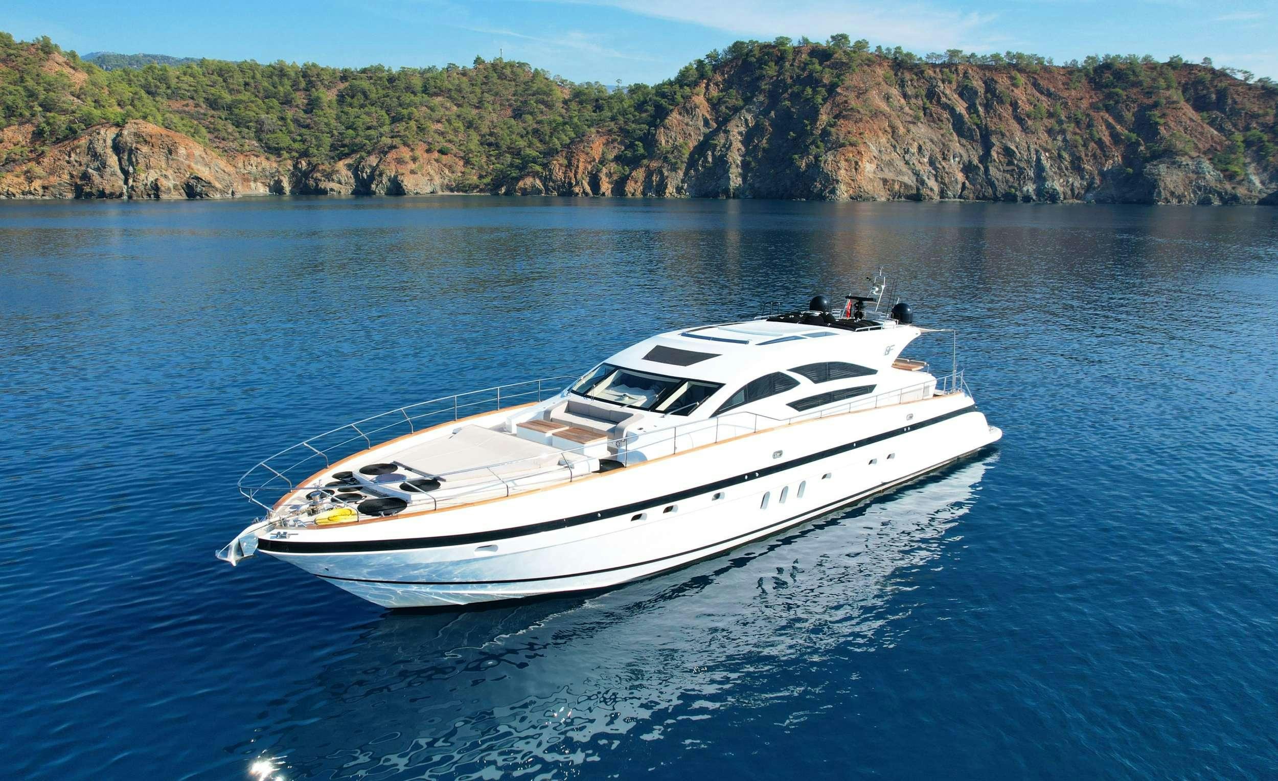 a white yacht on the water aboard GOLDFINGER Yacht for Charter