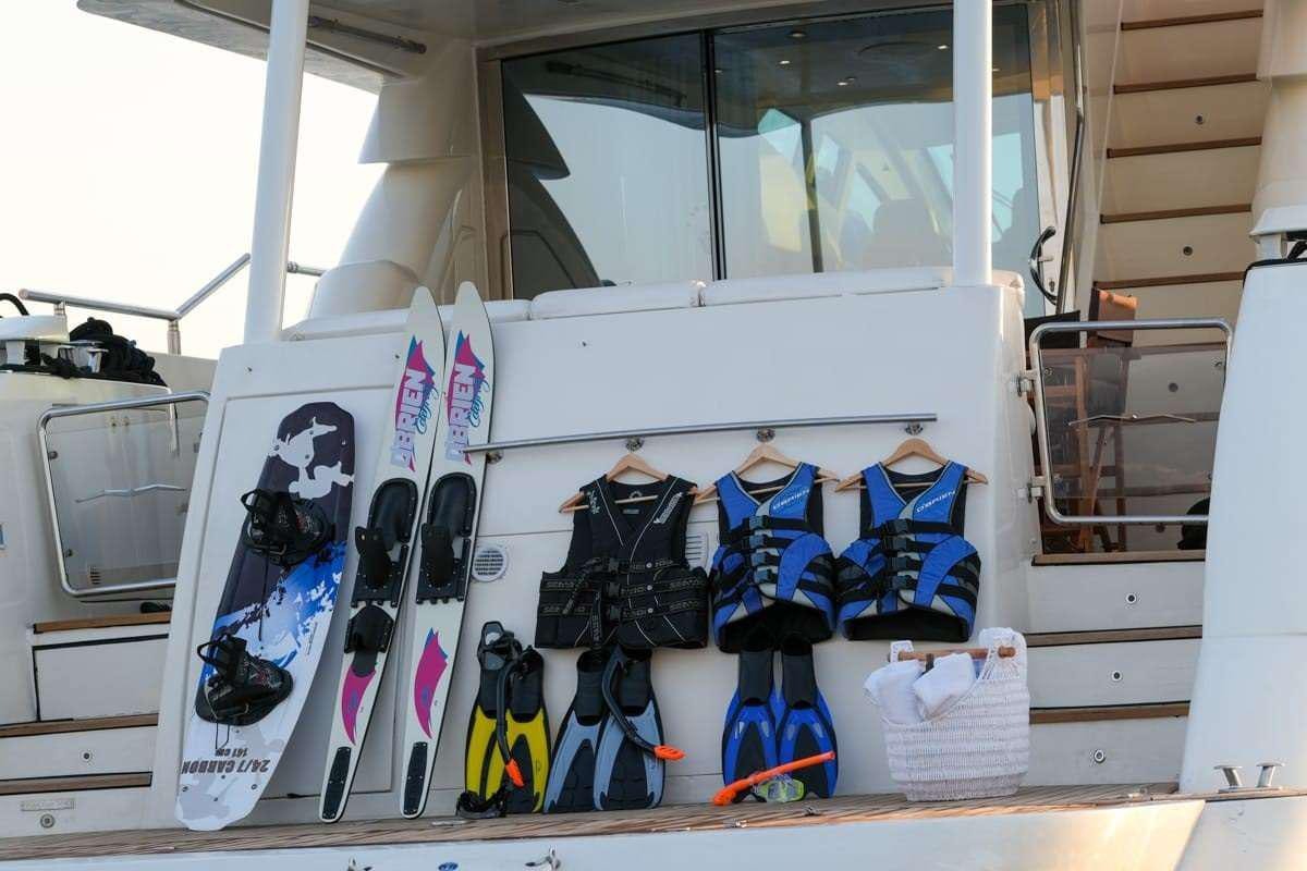 a group of snowboarders on a white shelf aboard SUMMER THERAPY Yacht for Charter