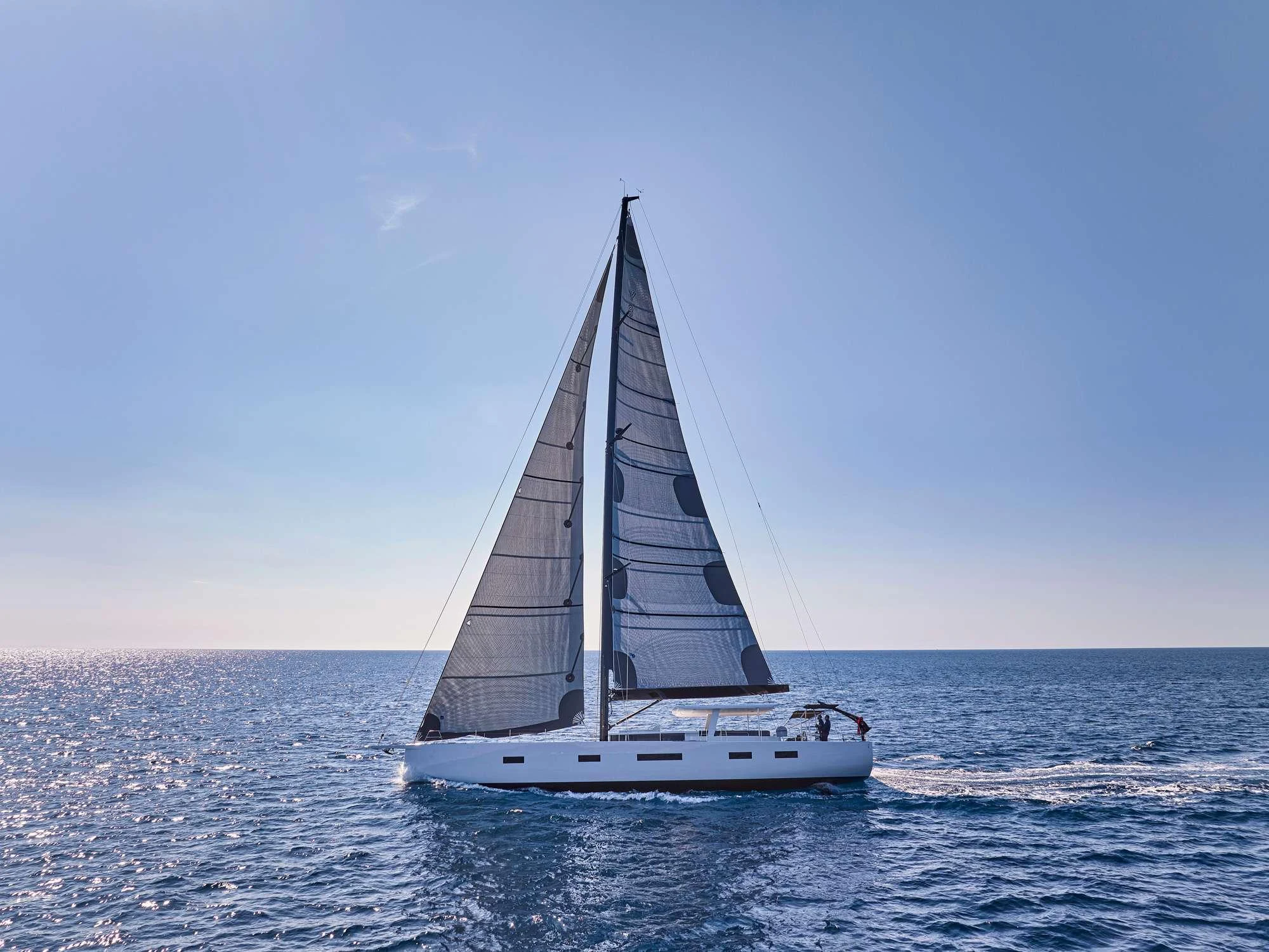 a sailboat in the water aboard NADAMAS Yacht for Charter