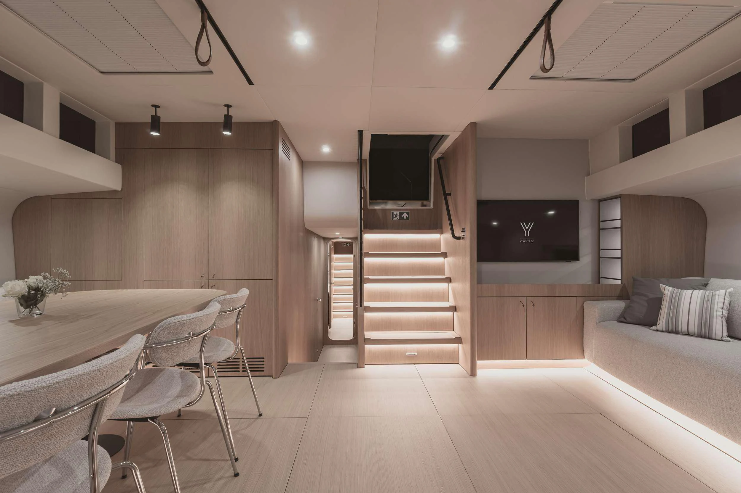 a modern looking living room aboard NADAMAS Yacht for Charter