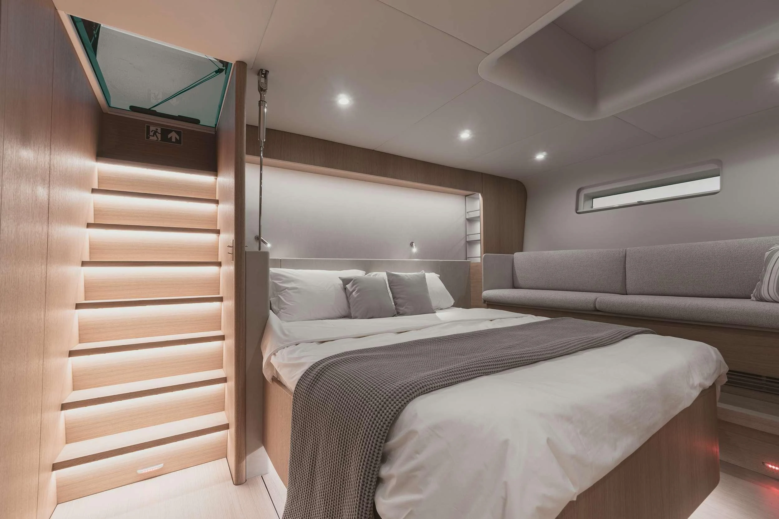 a bed in a room aboard NADAMAS Yacht for Charter