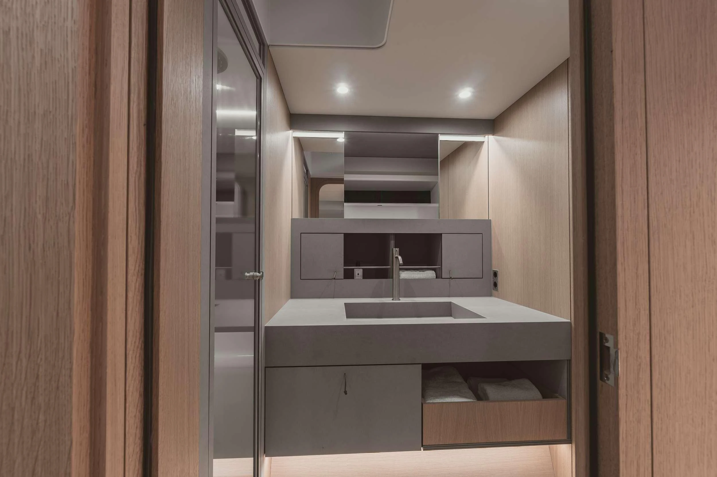 a kitchen with a sink and cabinets aboard NADAMAS Yacht for Charter