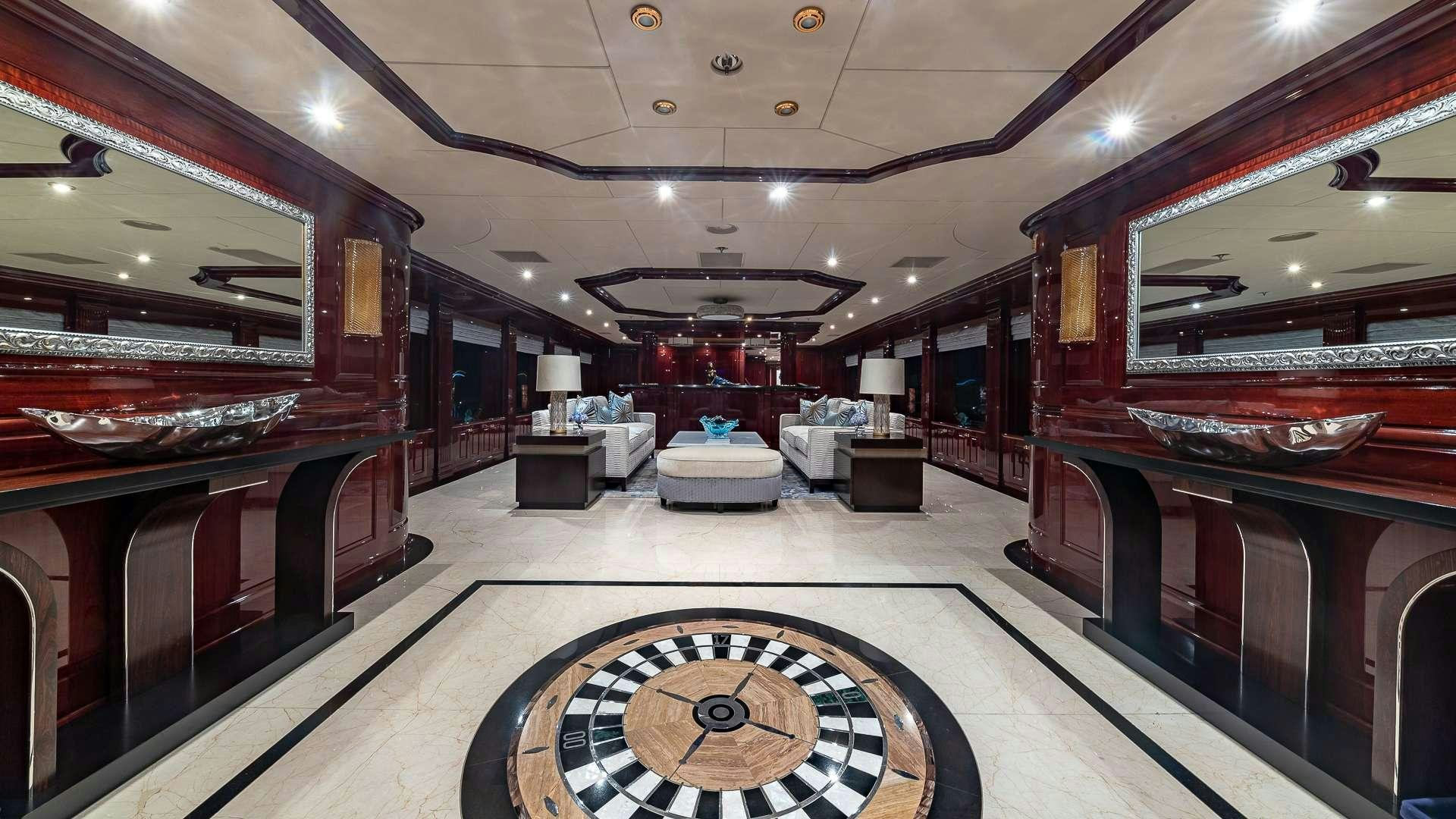 a large room with a large mirror aboard LADY ELAINE Yacht for Charter