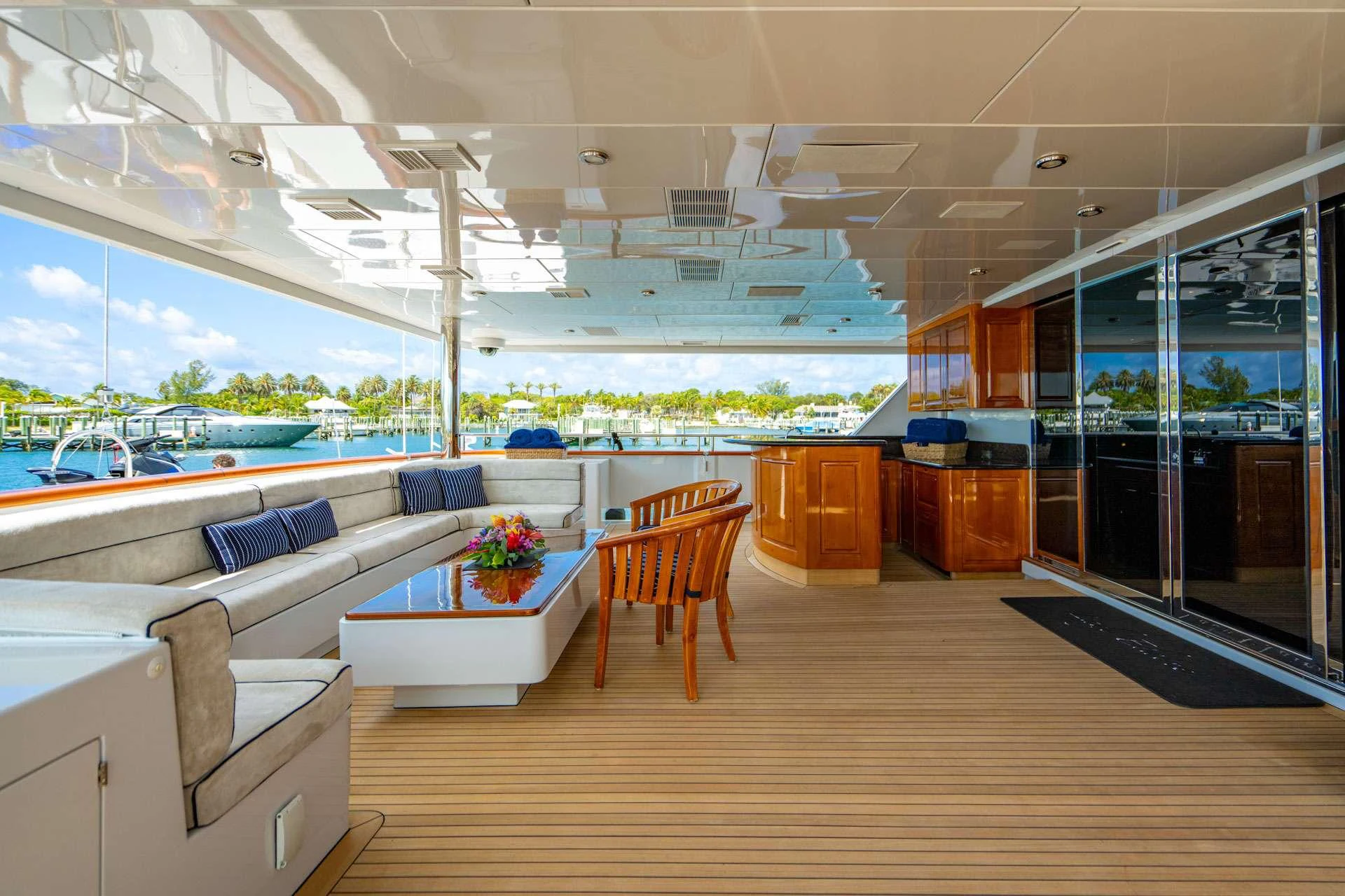 a room with a couch and a table aboard CASINO ROYALE Yacht for Charter