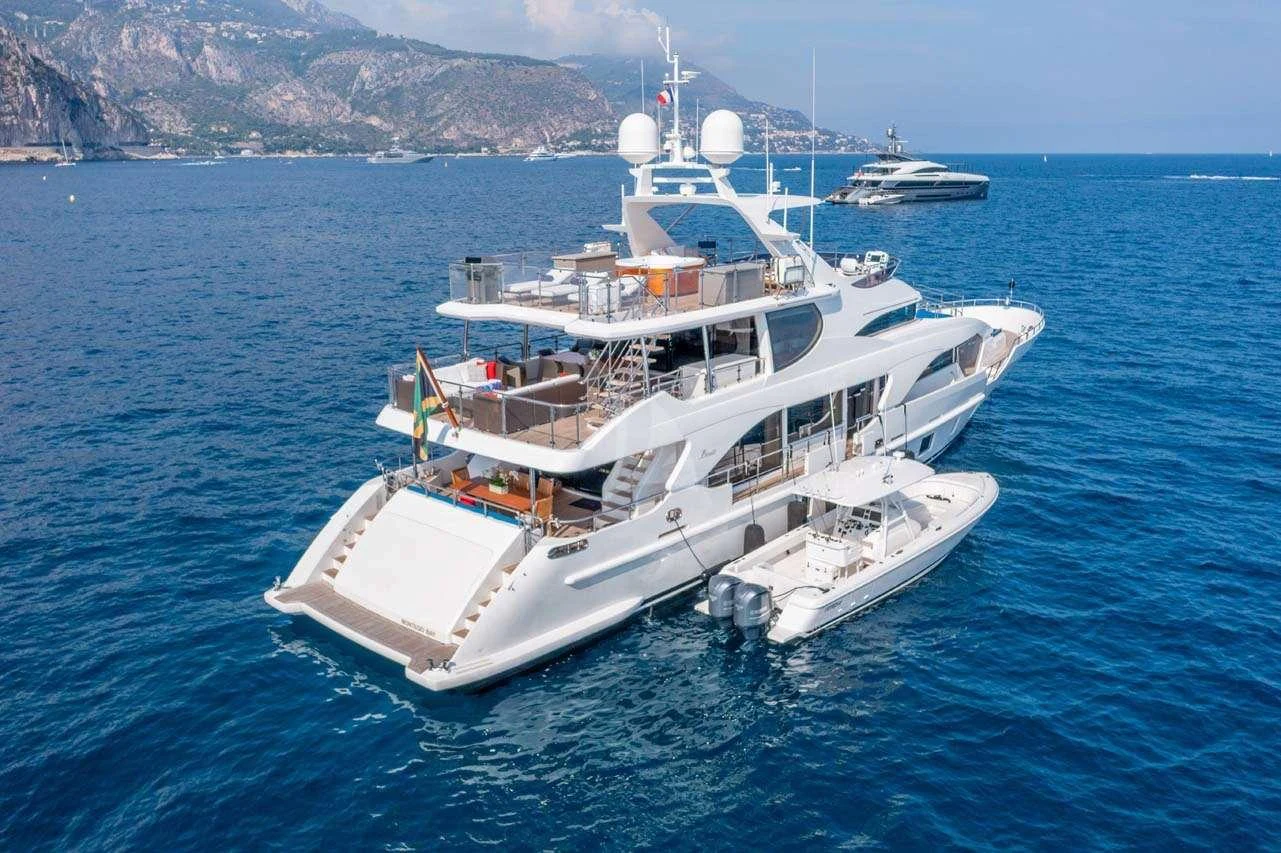 a large ship in the water aboard LULU Yacht for Charter