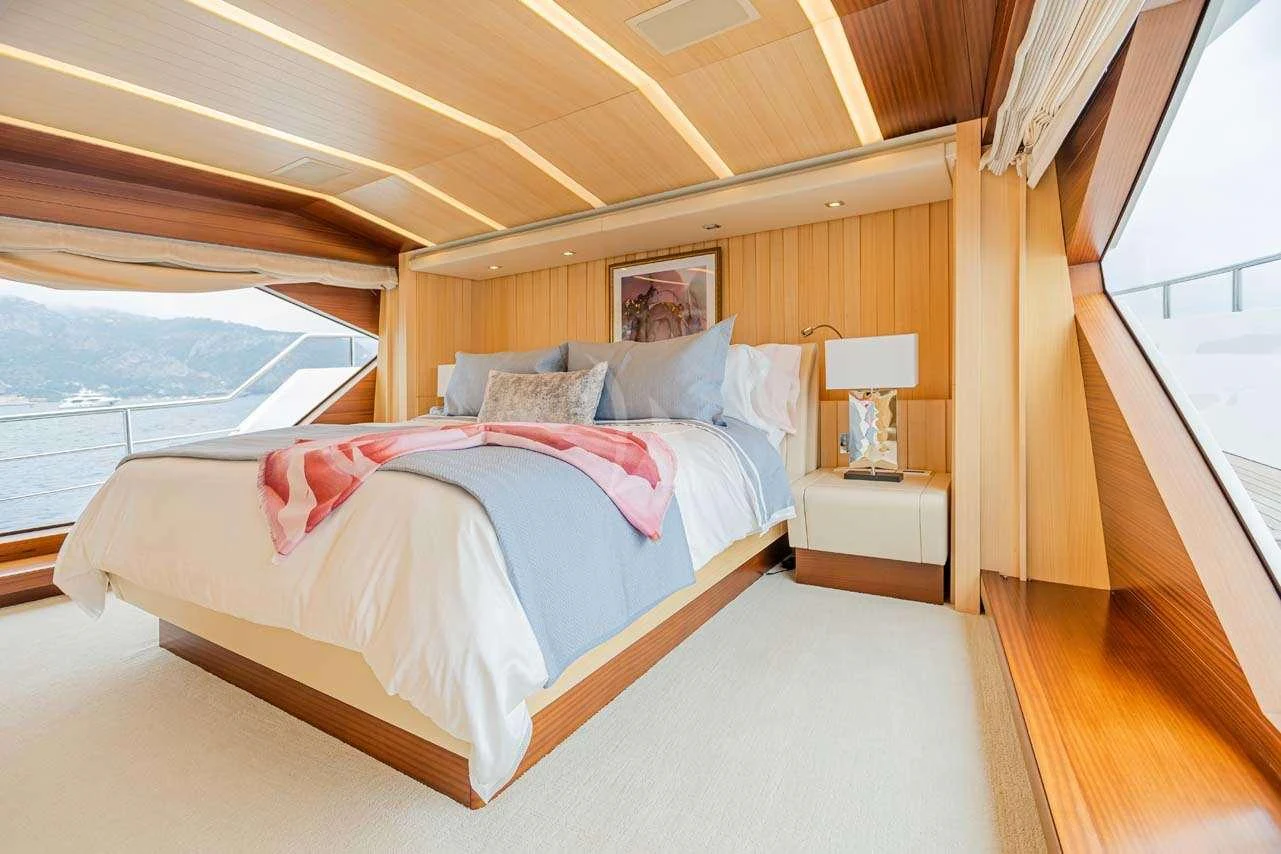 a bed in a room aboard LULU Yacht for Charter