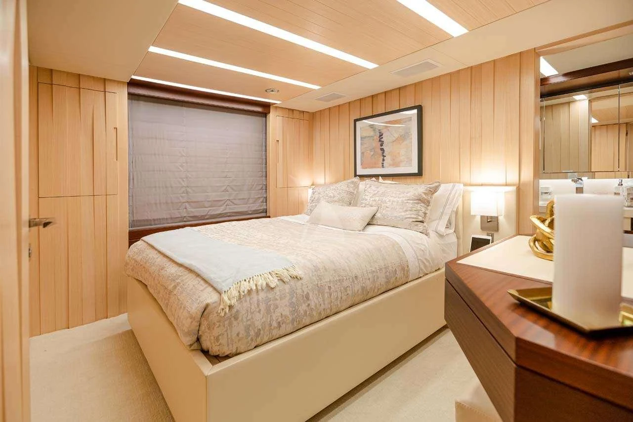 a bed in a room aboard LULU Yacht for Charter