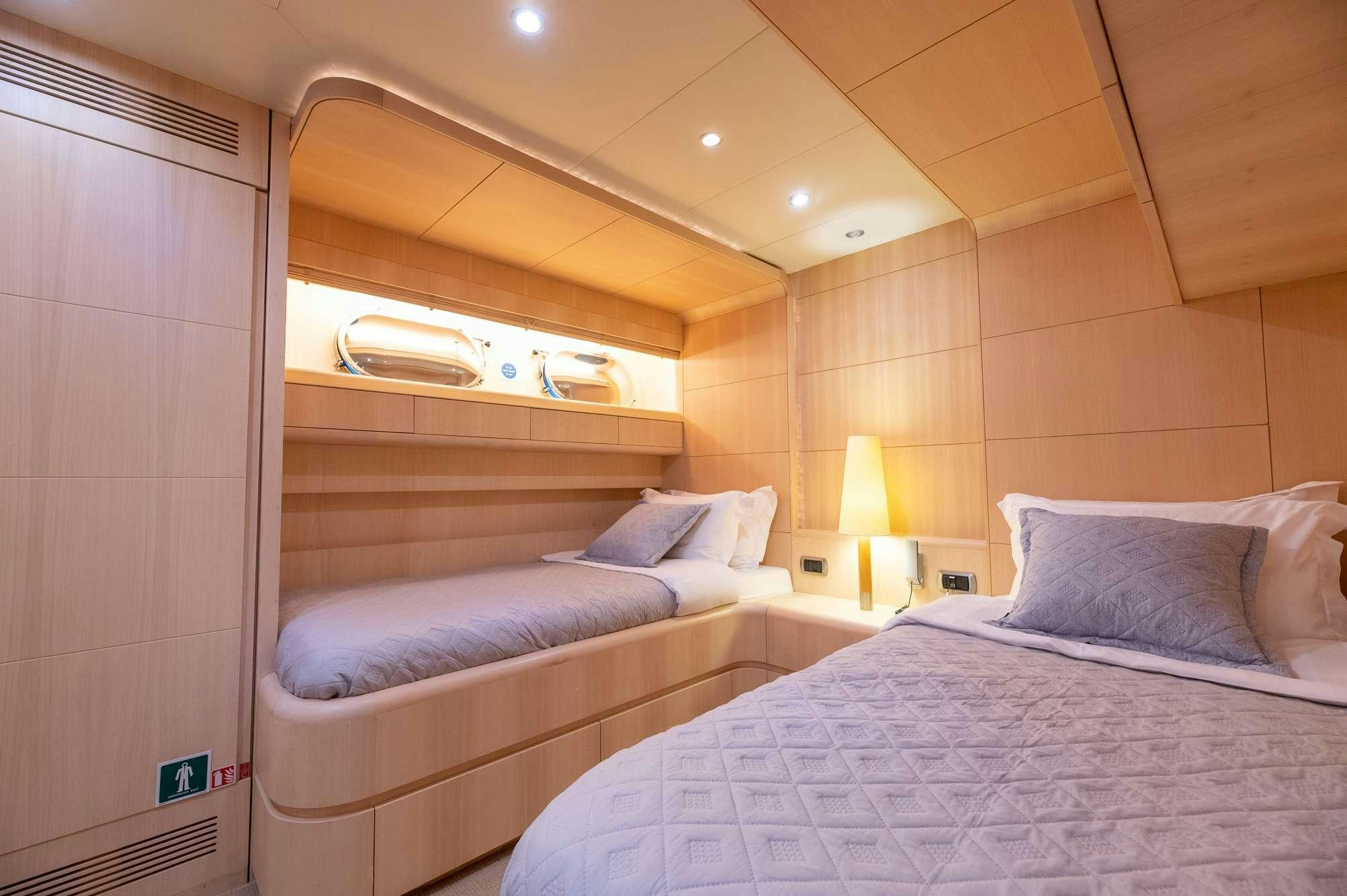 a room with two beds aboard PEREAKI II Yacht for Charter