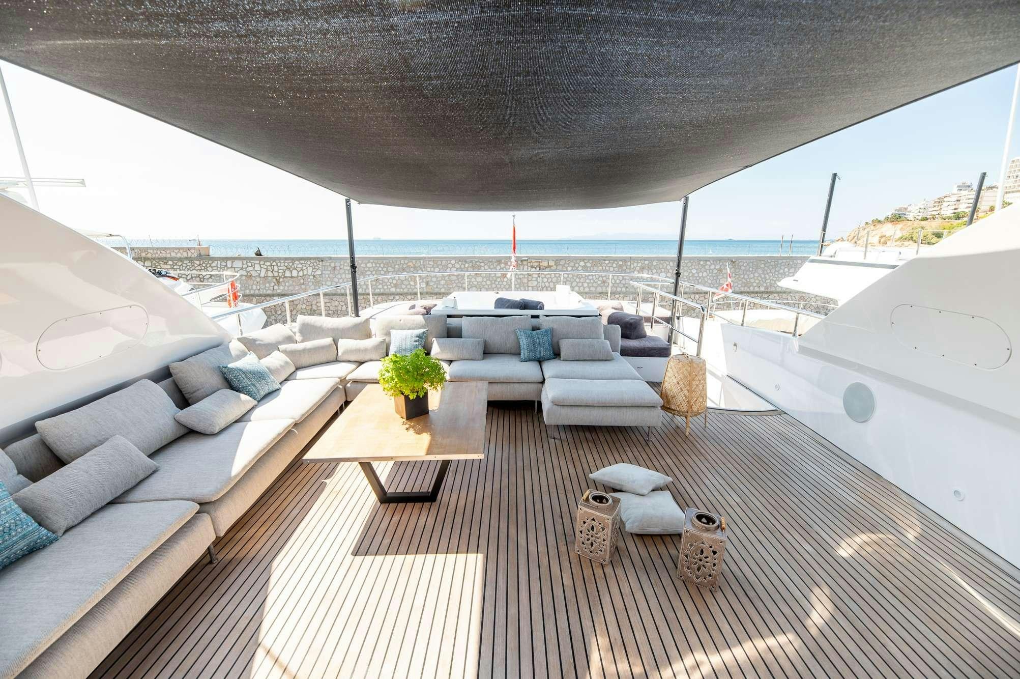 a lounge area on a boat aboard PEREAKI II Yacht for Charter