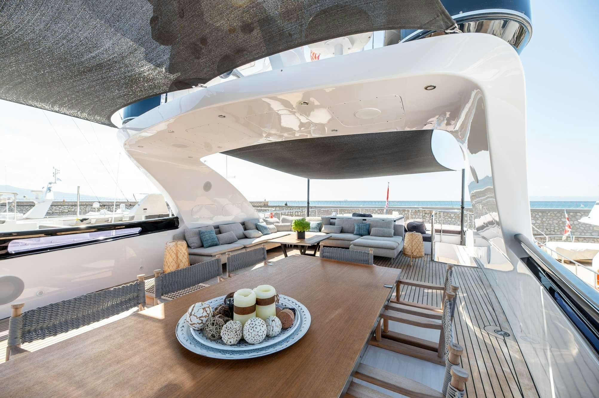 a large white building with a balcony aboard PEREAKI II Yacht for Charter