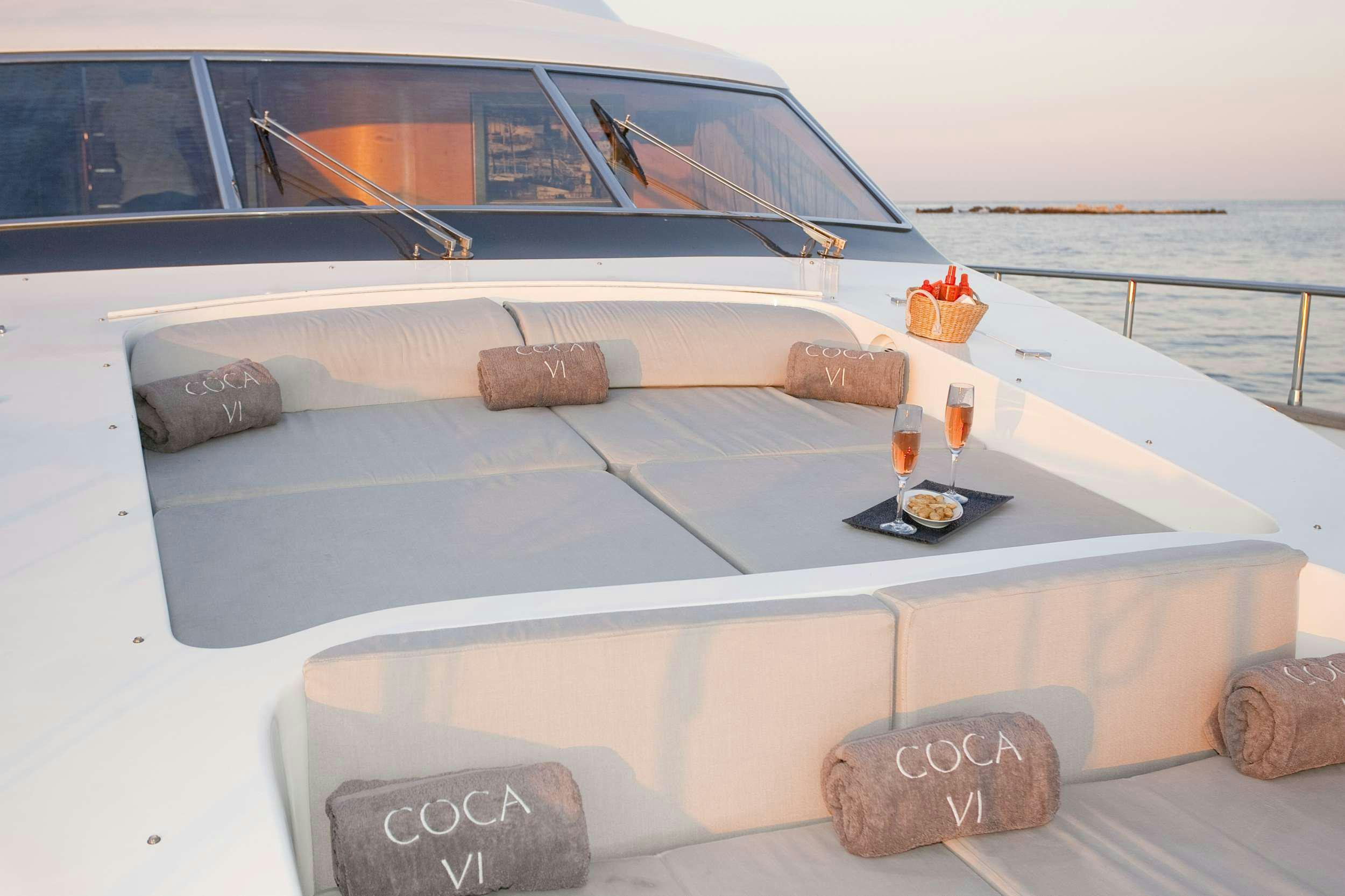 a boat on the water aboard COCA VI Yacht for Charter