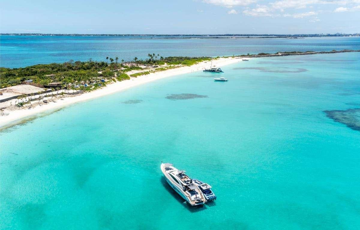 a car driving through a body of water aboard NEW LIFE Yacht for Charter
