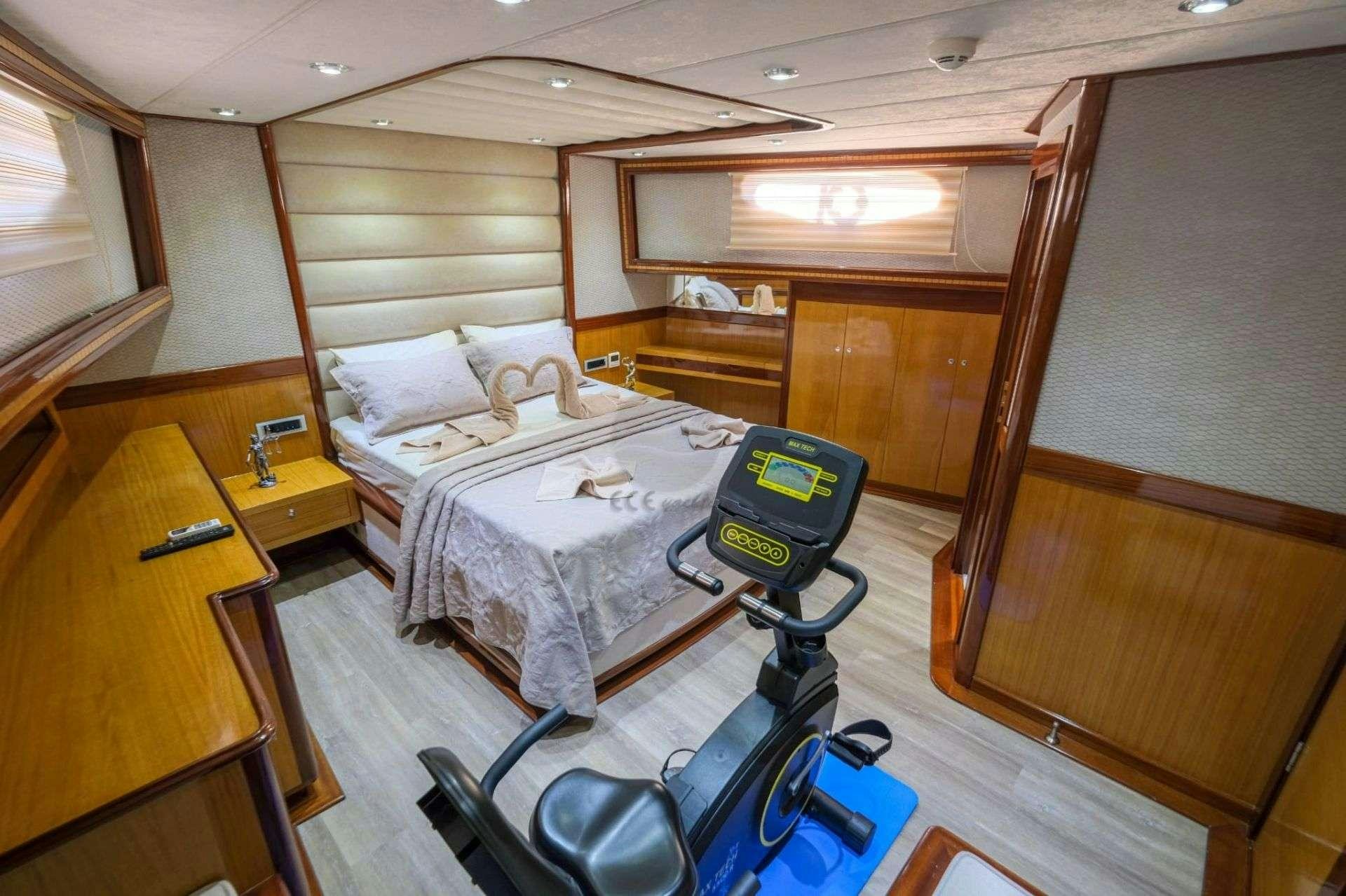 a bed in a room aboard DESTINY Yacht for Charter