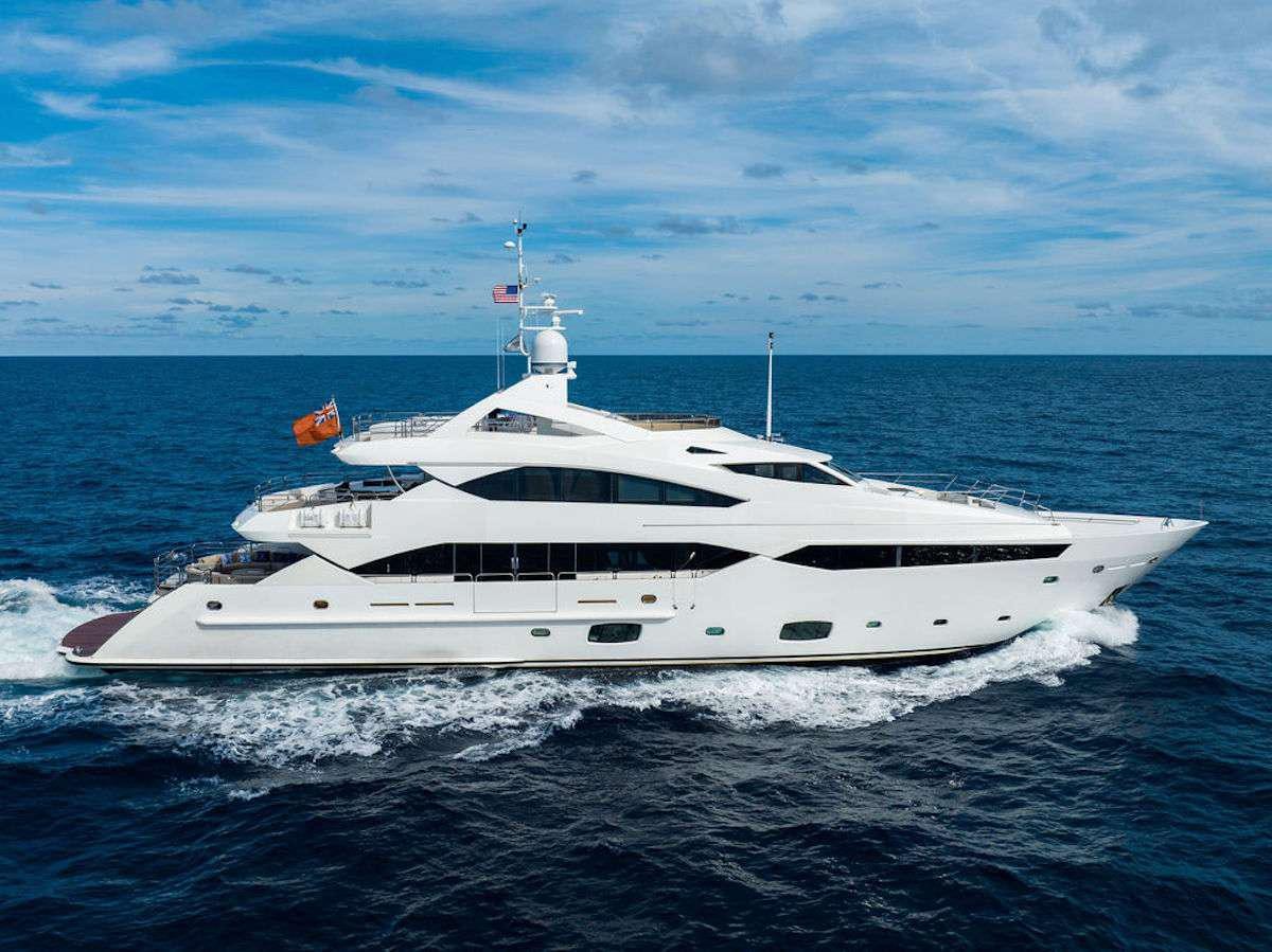 a white yacht in the water aboard ABOUT TIME Yacht for Charter