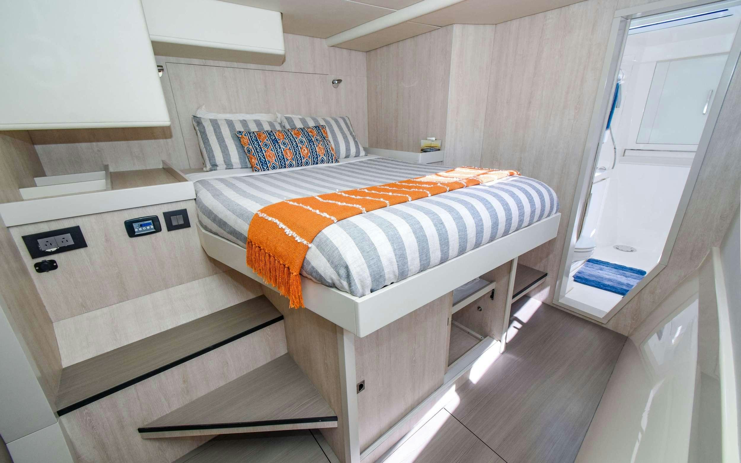 a bed in a room aboard LEEWAY Yacht for Charter