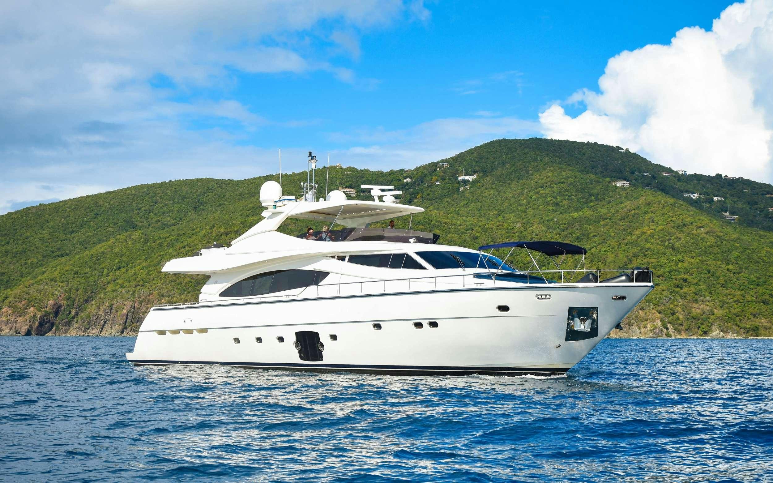 a white yacht on water aboard INDULGE II Yacht for Charter