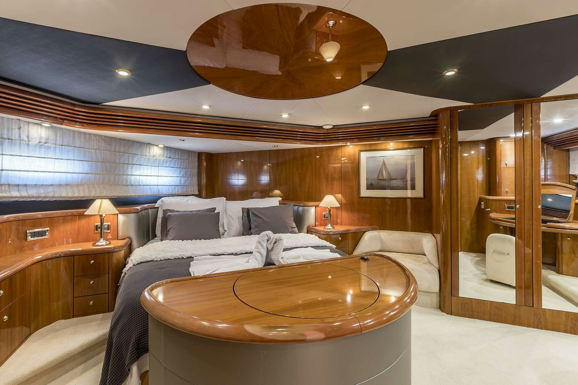 a large bedroom with a large bed aboard SKYWATER Yacht for Charter