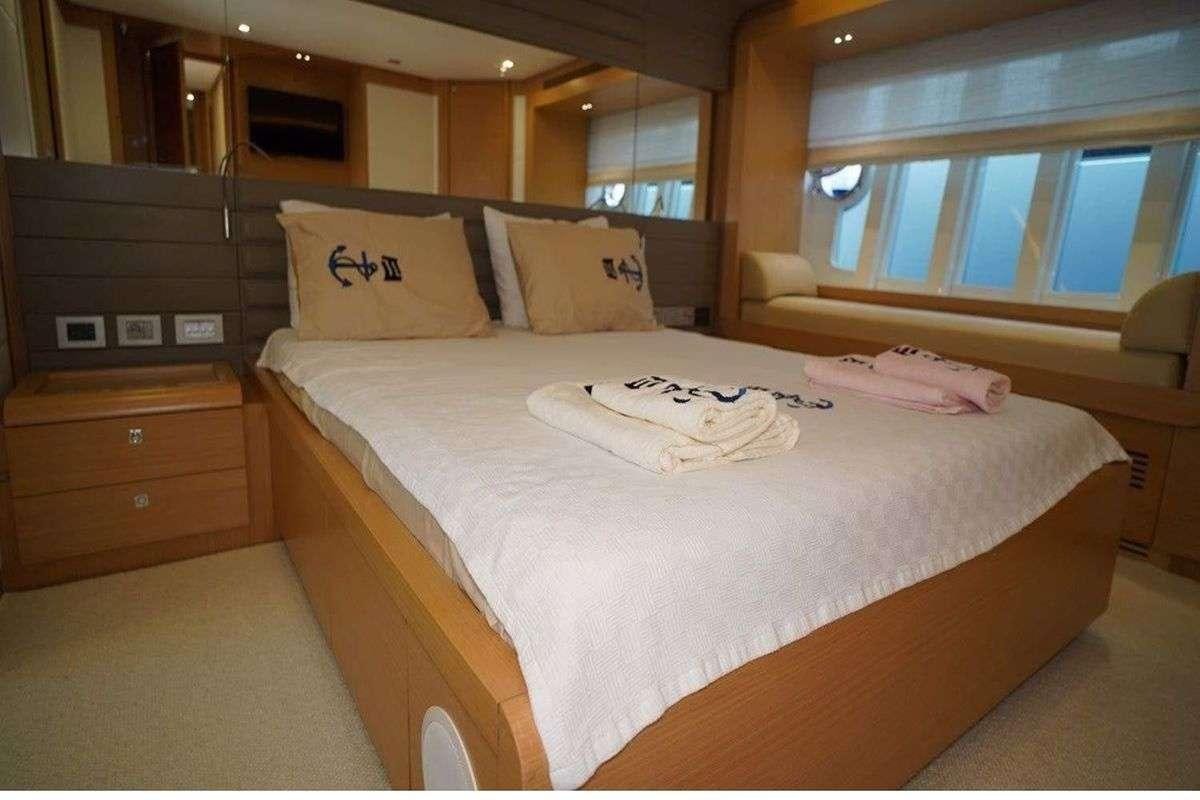 a bed in a room aboard REINE DES COEURS Yacht for Charter