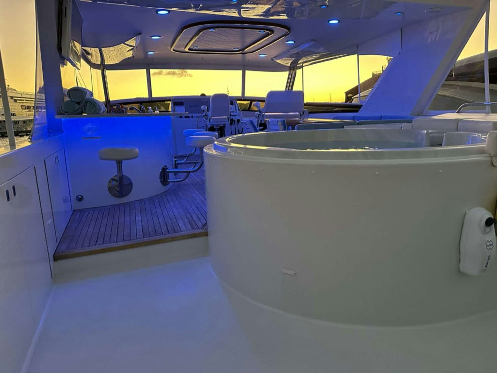 a room with a large white machine aboard ISLAND GIRL Yacht for Charter