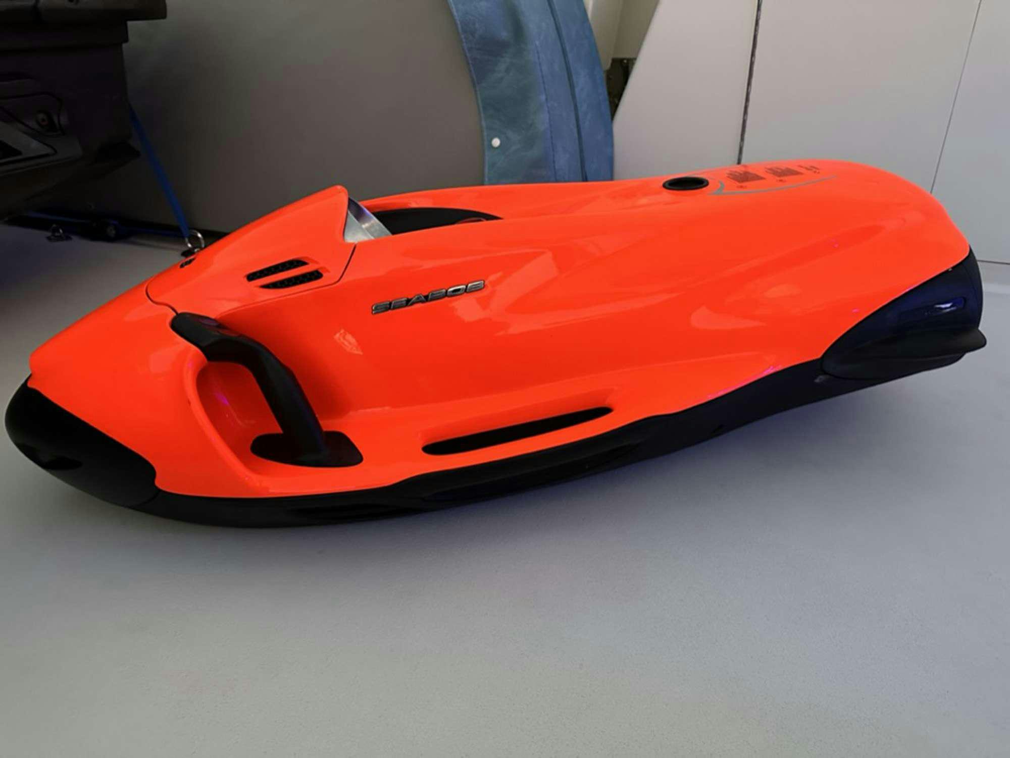 a red and black guitar aboard ISLAND GIRL Yacht for Charter