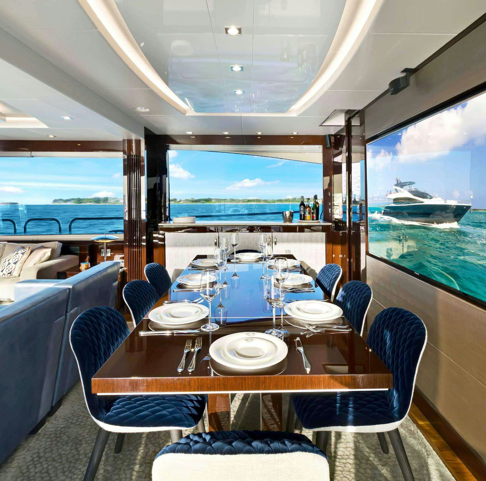 a restaurant with a large window aboard SYNERGY Yacht for Charter