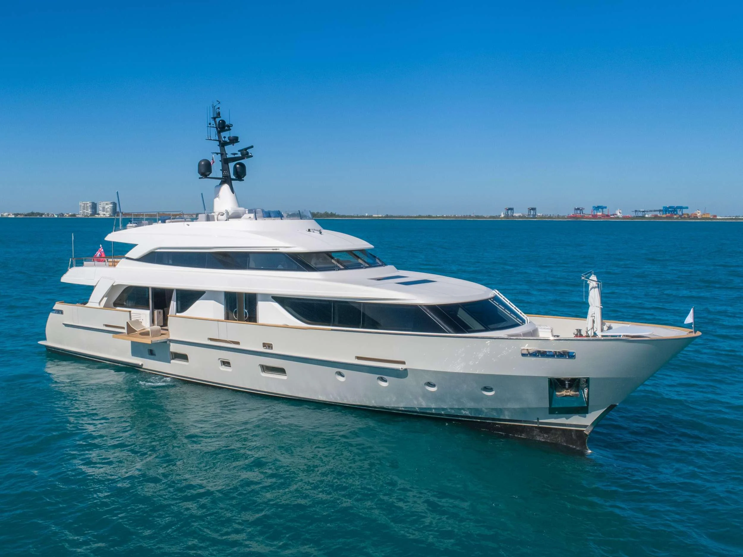 a white yacht in the water aboard PHOENIX Yacht for Charter