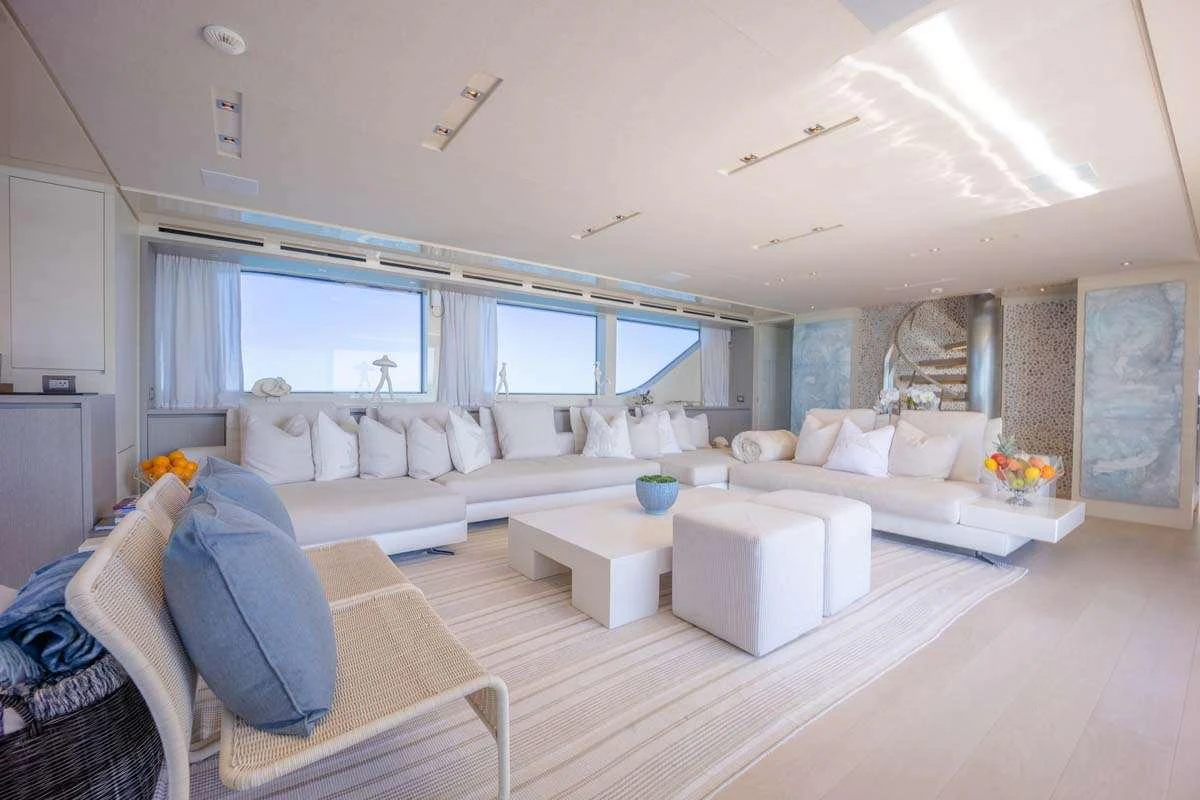 a living room with a large window aboard PHOENIX Yacht for Charter