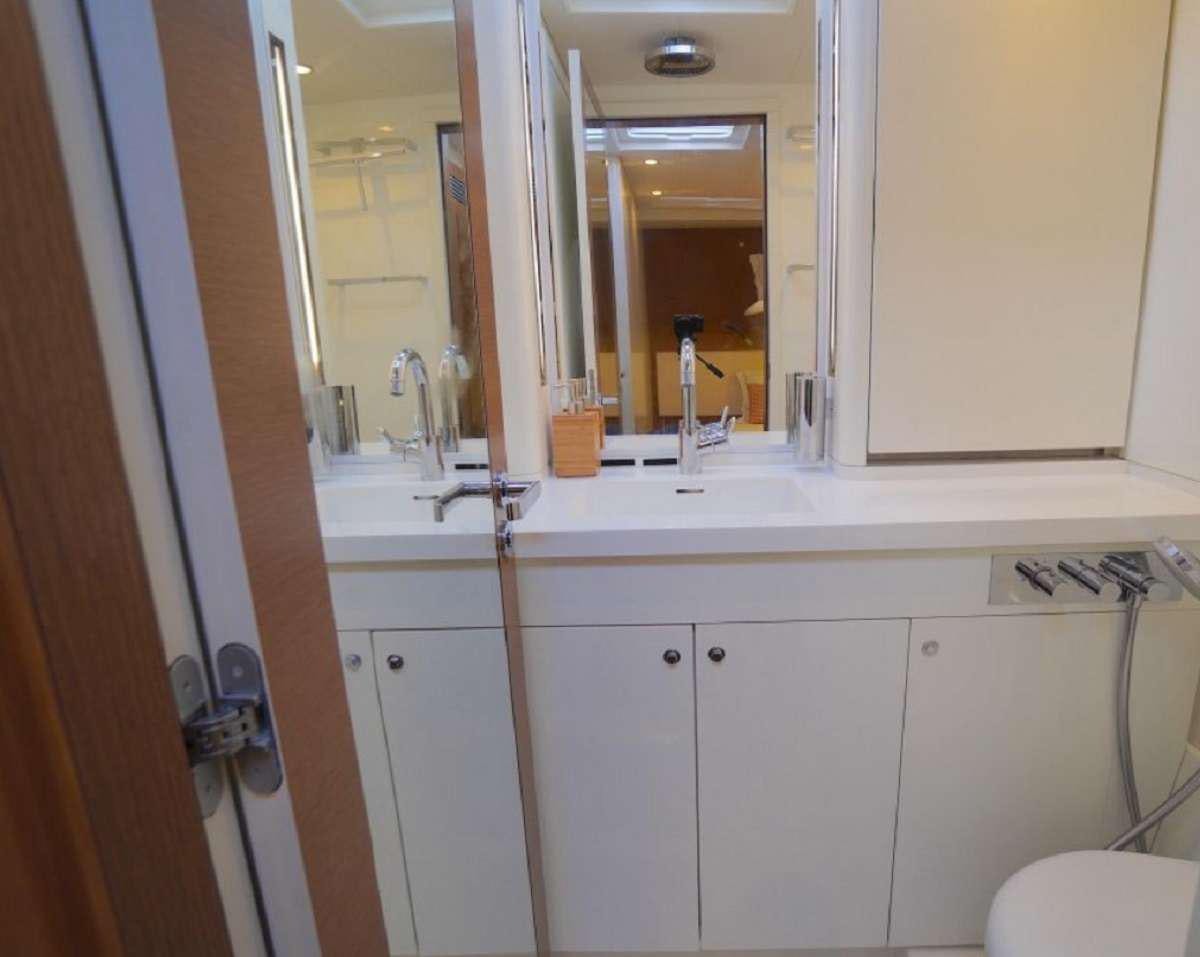 a bathroom with a sink and a toilet aboard AENEA Yacht for Charter