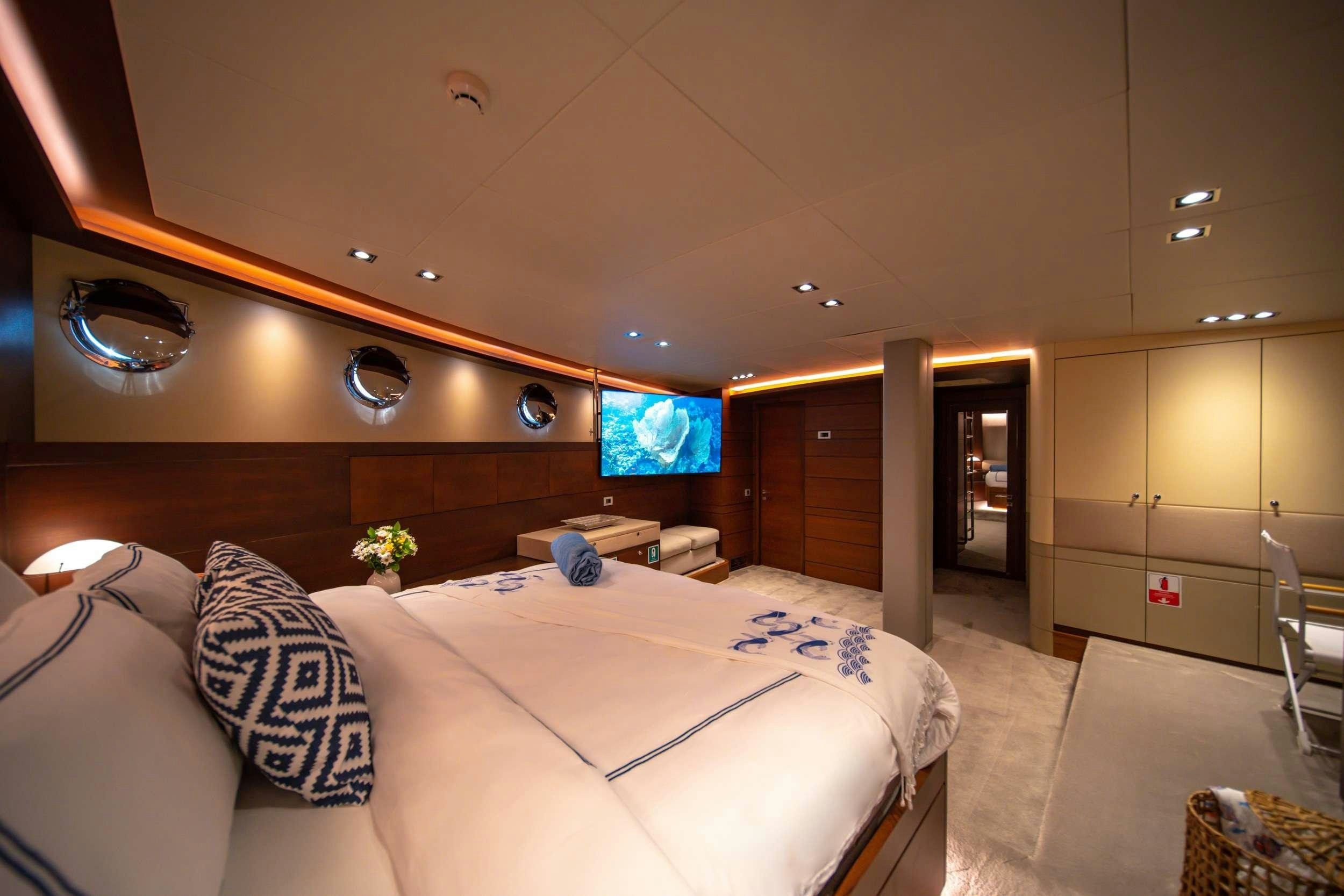 a large bed in a room aboard DOUBLE EAGLE Yacht for Charter