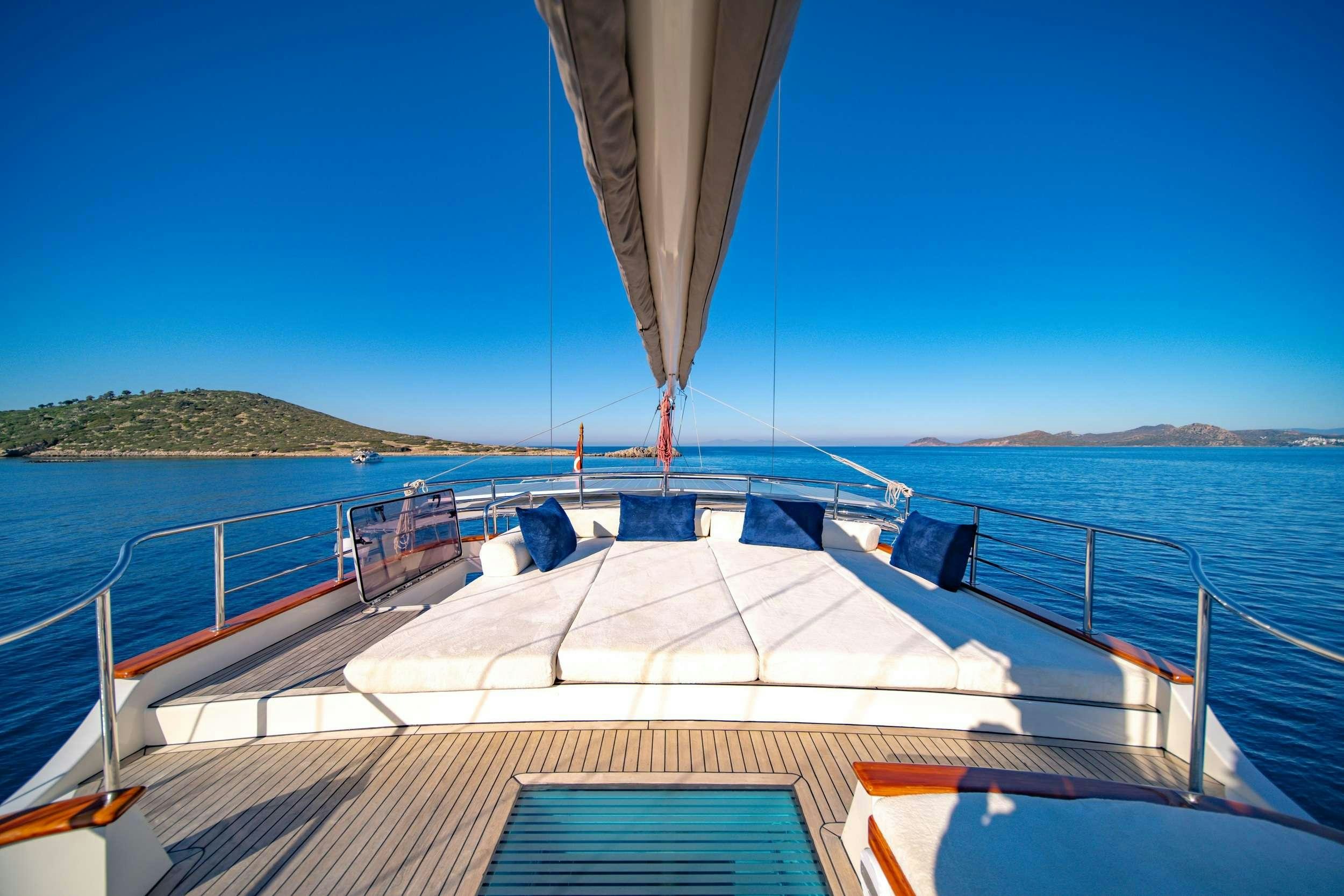 a large boat on the water aboard DOUBLE EAGLE Yacht for Charter