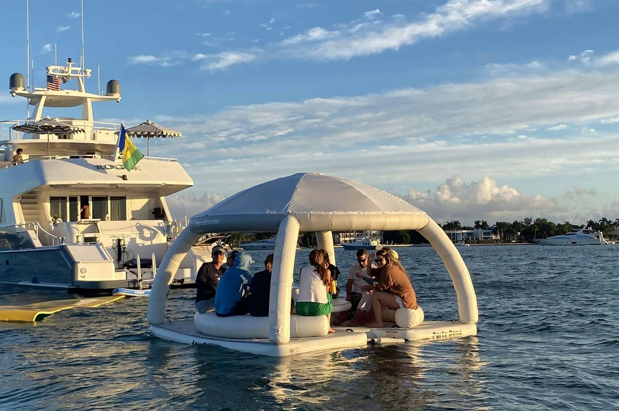 a group of people in a boat aboard ROGUE Yacht for Charter