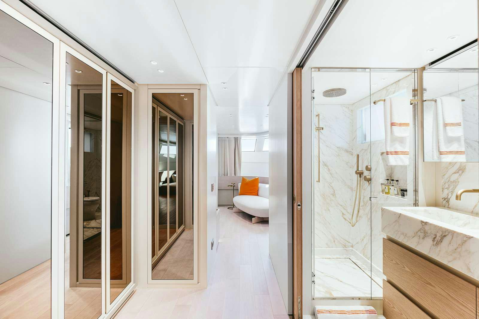 a bathroom with a glass shower aboard PEARL Yacht for Charter