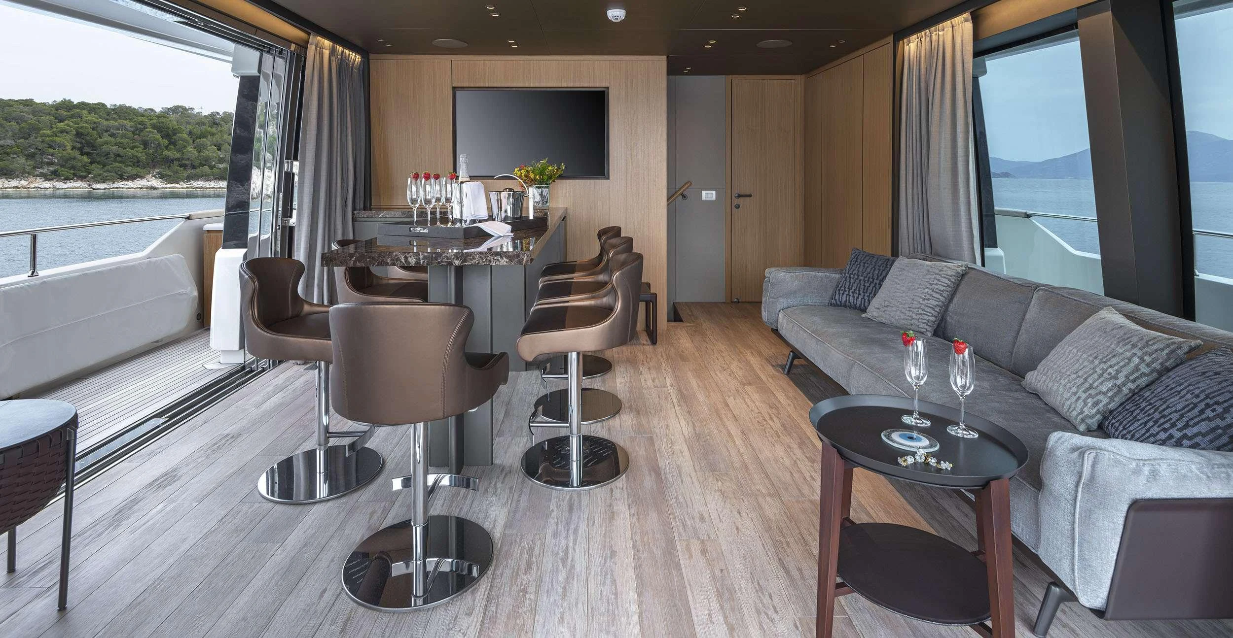 a living room with a couch and a table aboard FATSA Yacht for Charter