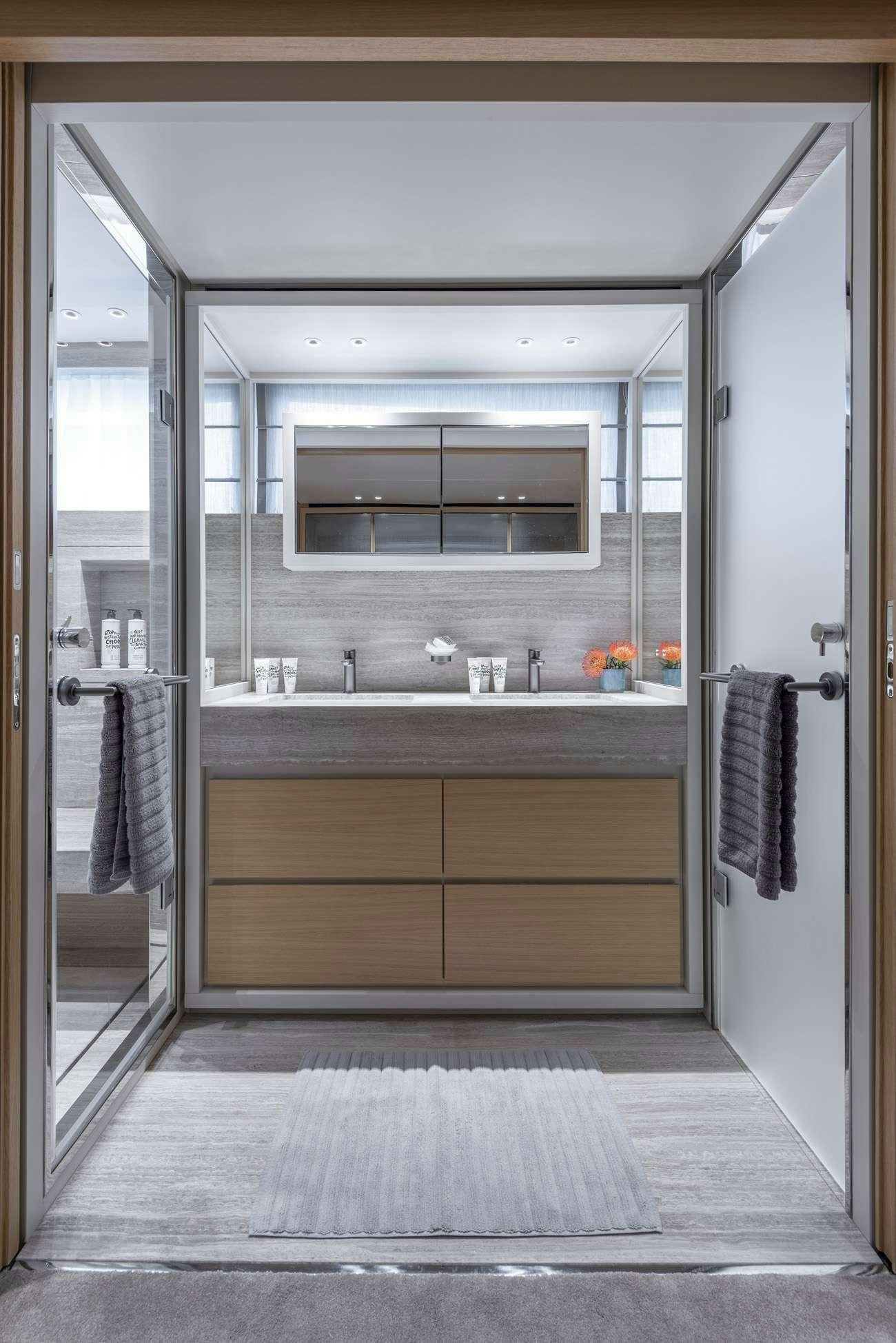 a bathroom with a large mirror aboard FATSA Yacht for Charter