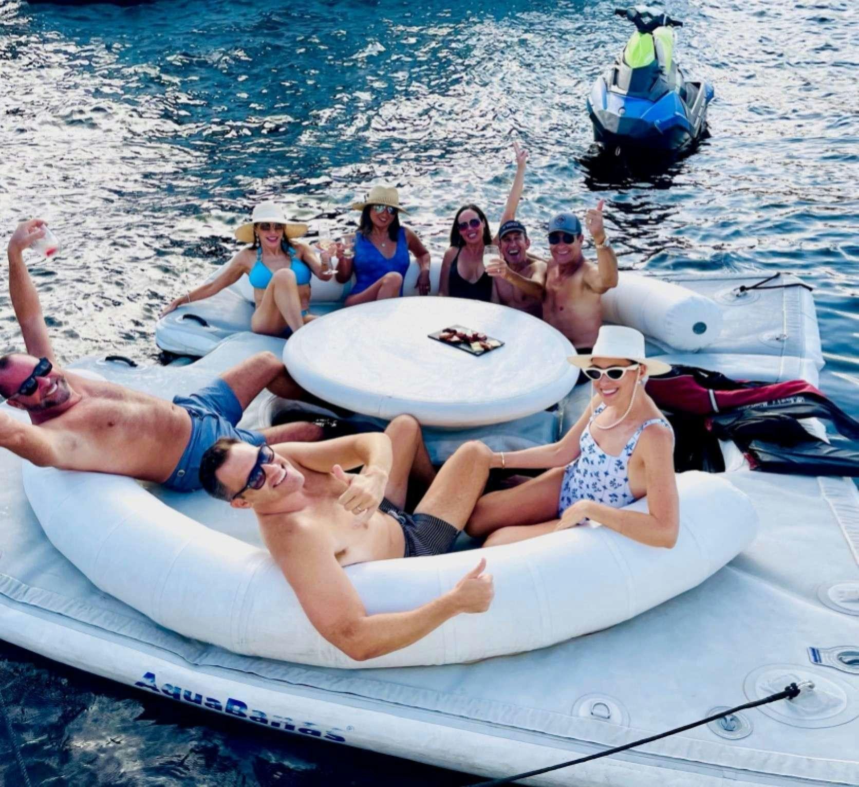 a group of people in a pool aboard LADY KRISTINA Yacht for Charter