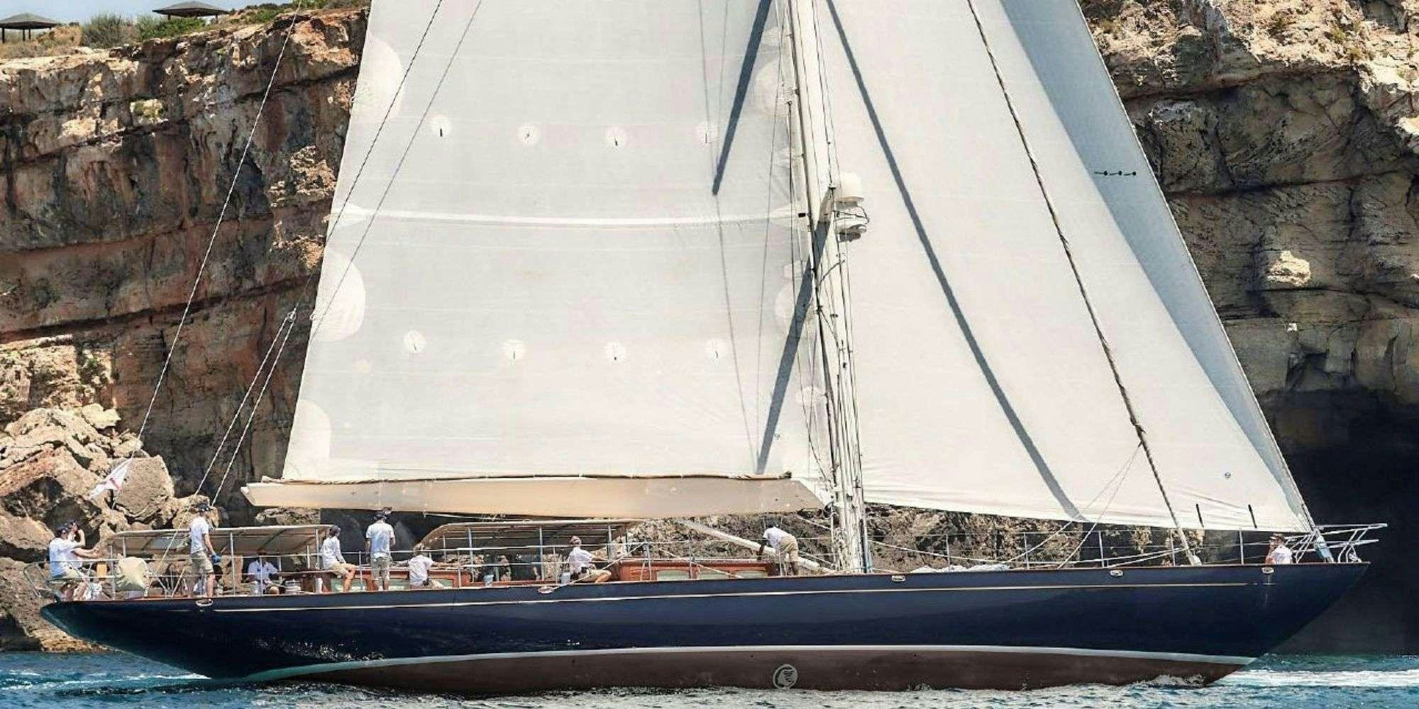 a boat with a sail aboard ATALANTE Yacht for Charter