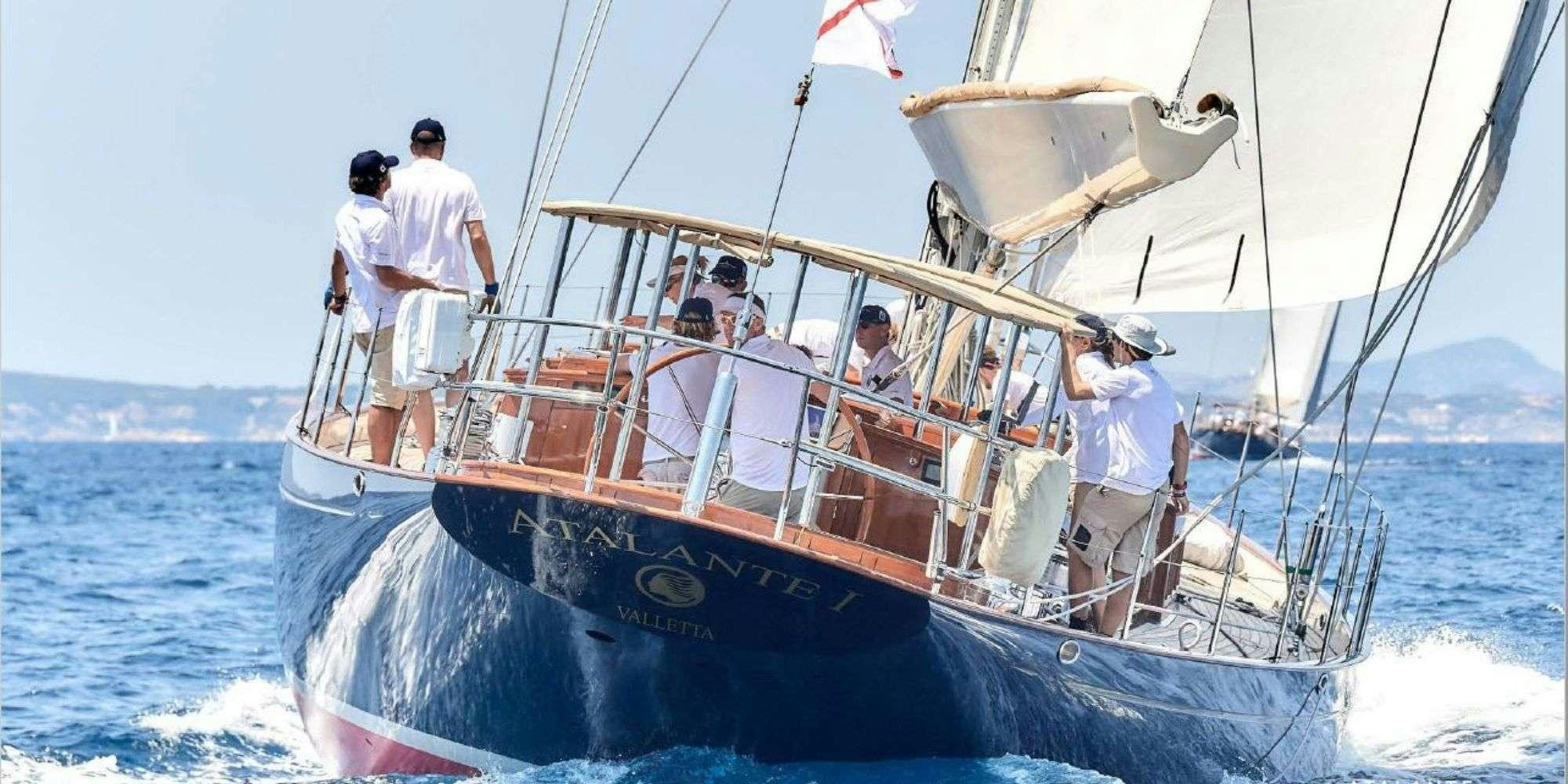 a group of people on a boat aboard ATALANTE Yacht for Charter