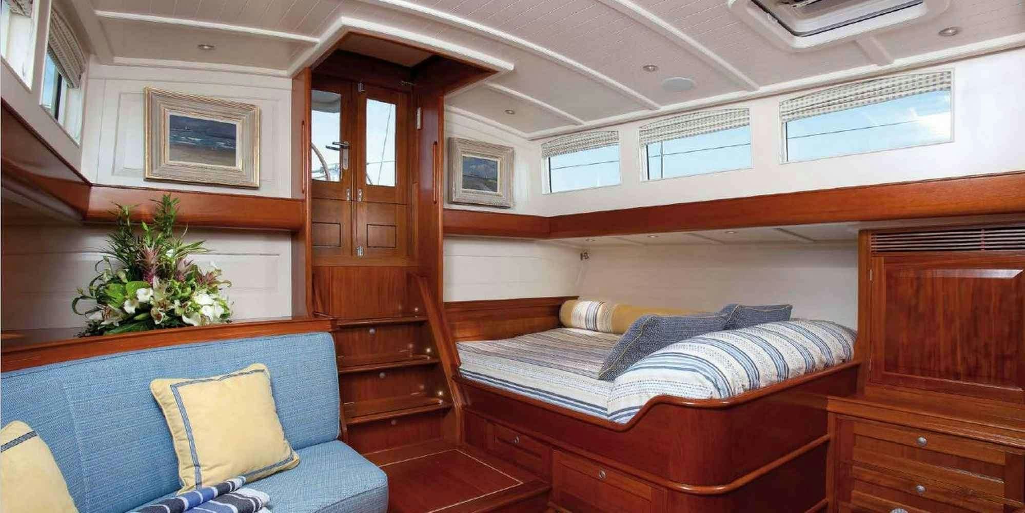 a bed in a room aboard ATALANTE Yacht for Charter