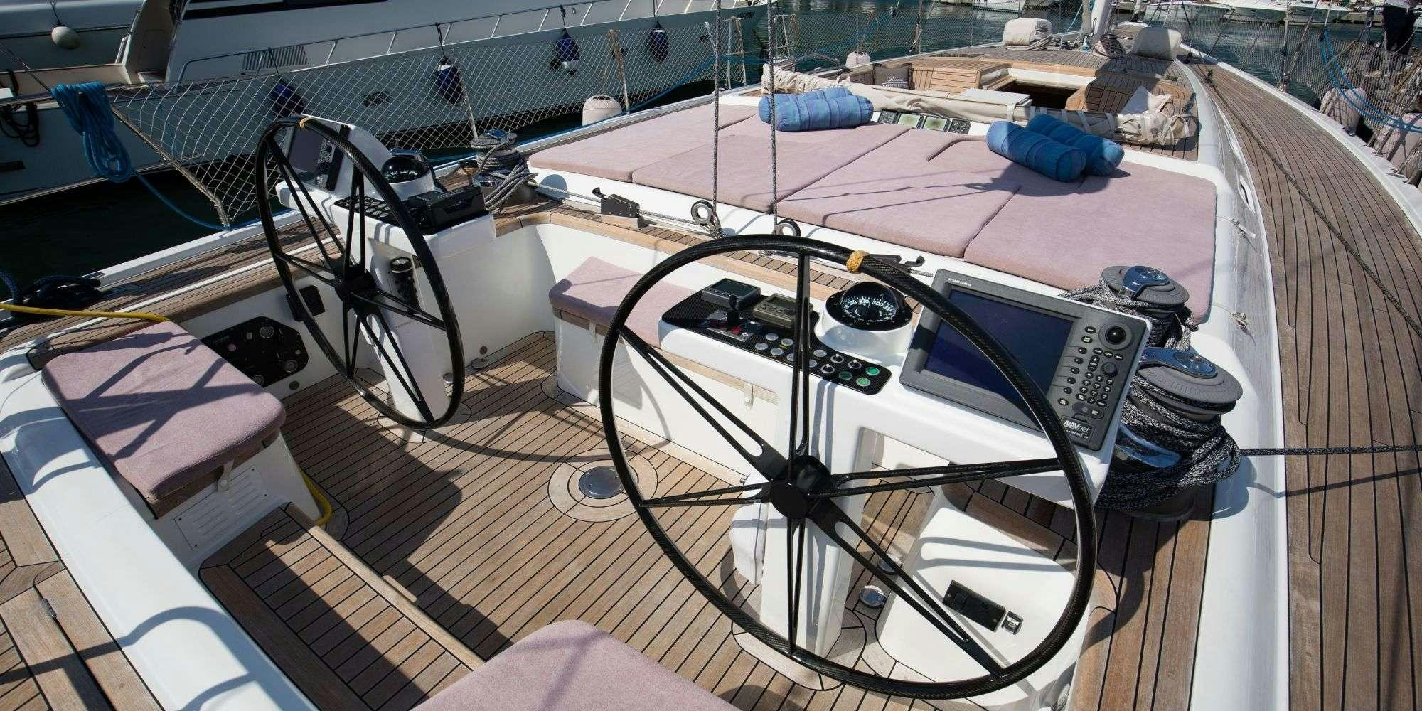 a machine on the floor aboard LA VIDELLE Yacht for Charter