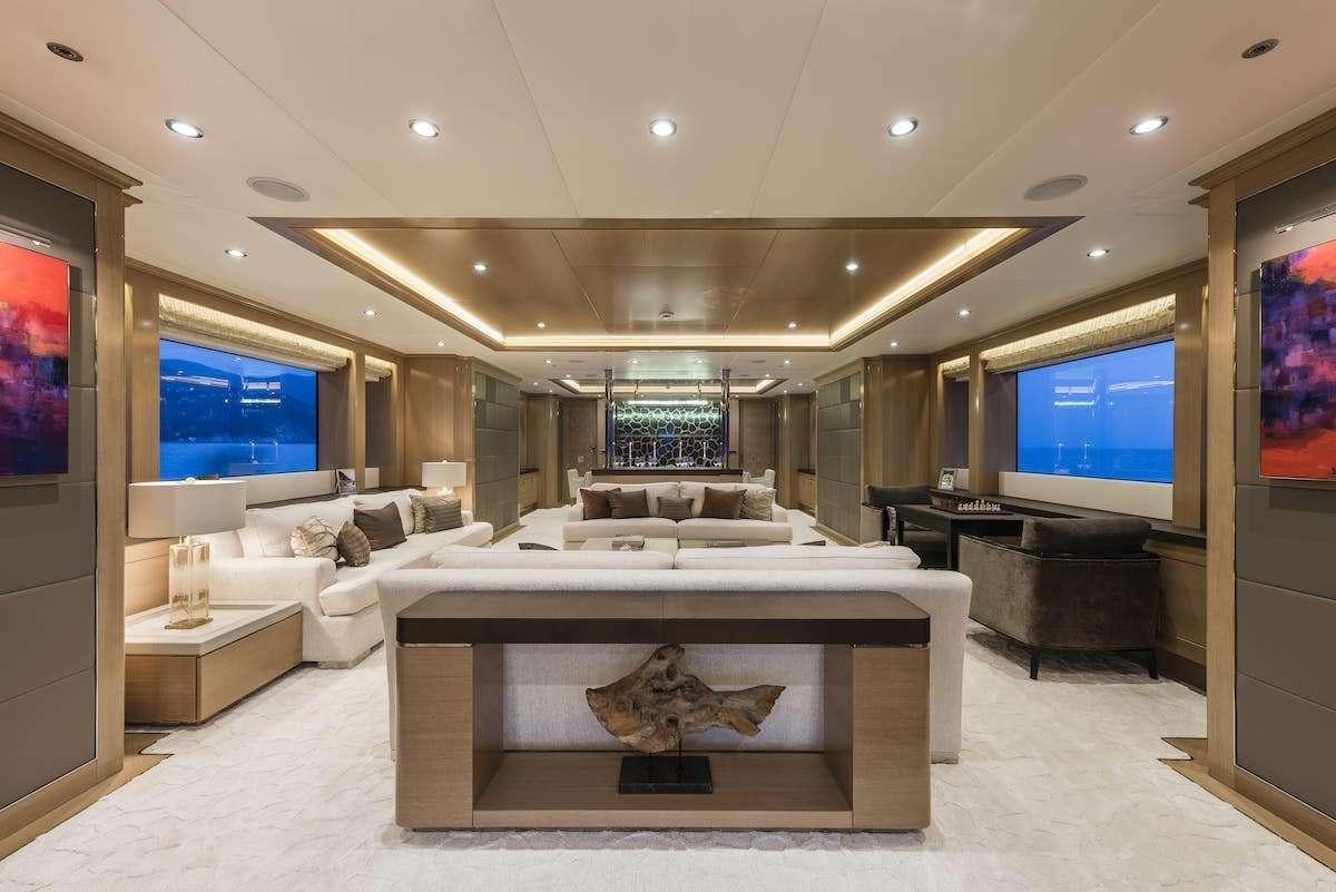 a large room with a large bed aboard AUDACES Yacht for Charter