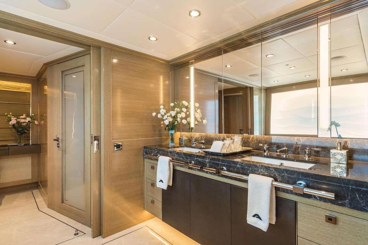 a bathroom with a large countertop aboard AUDACES Yacht for Charter