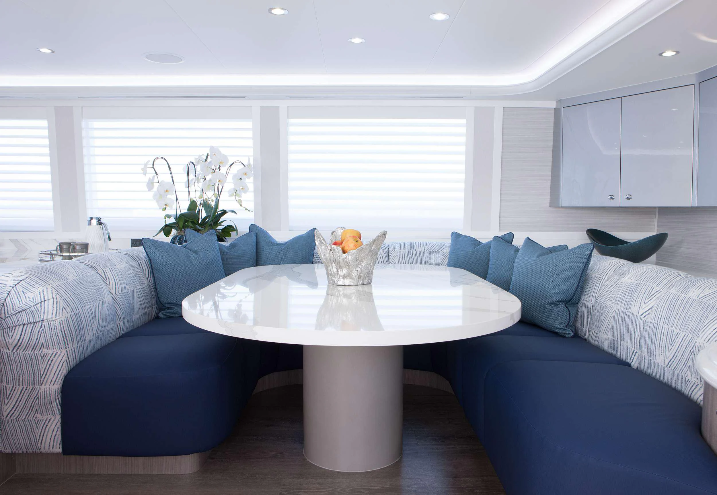 a living room with a couch and a coffee table aboard HANNAH Yacht for Charter