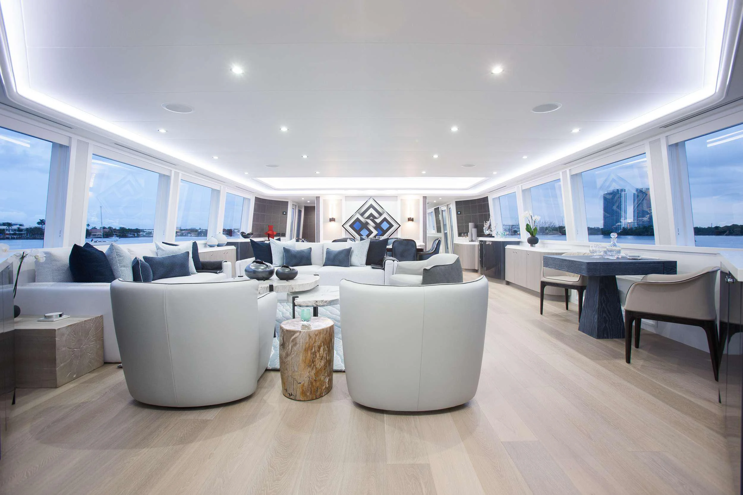 a living room with a large window aboard HANNAH Yacht for Charter